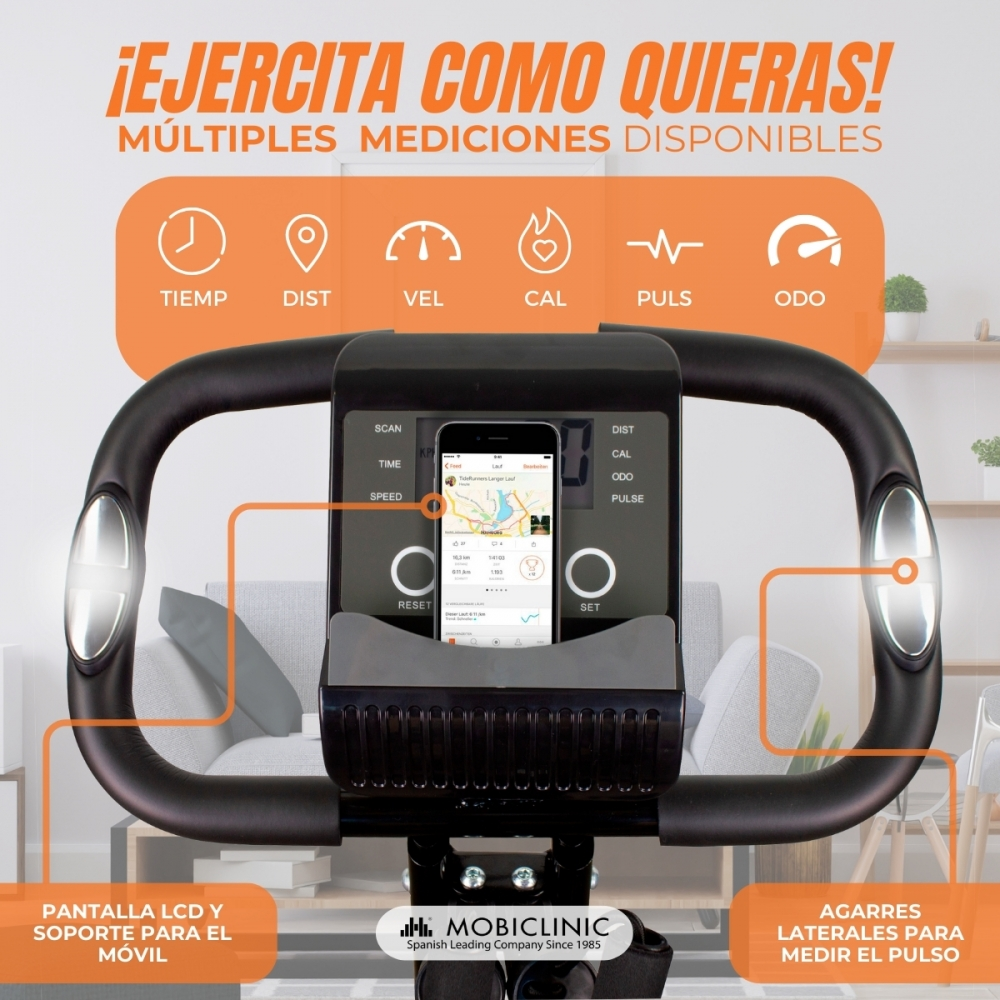 Bicicleta estática con pantalla LCD que muestra datos. Acentos naranjas resaltan funciones como tiempo, distancia y ritmo cardíaco. Texto: '¡Ejercita como quieras!'