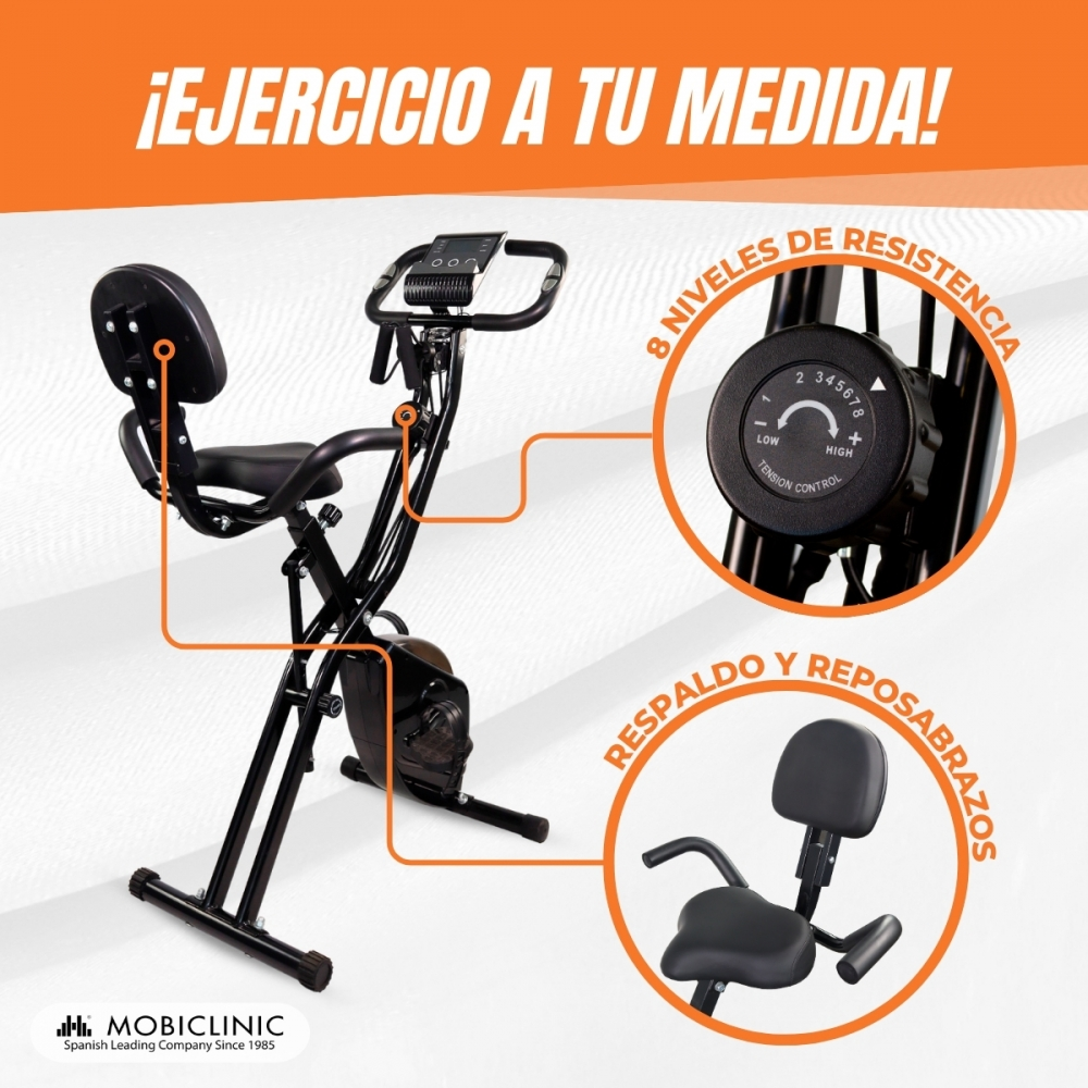 Bicicleta estática negra con respaldo y reposabrazos. Incluye niveles de resistencia, control de tensión y el logotipo de MOBICLINIC.