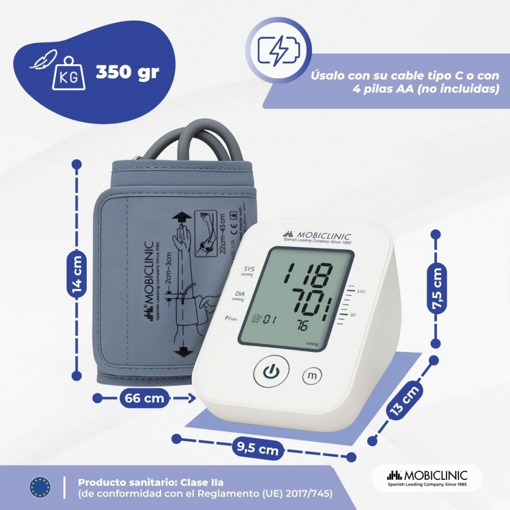 Un tensiómetro con brazalete y pantalla digital. Las mediciones se muestran en la pantalla. Se indican las dimensiones alrededor.