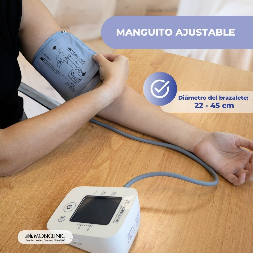 Brazo de persona con brazalete de presión arterial y dispositivo. El texto dice 'Manguito ajustable' y 'Diámetro del brazalete: 22-45 cm'.