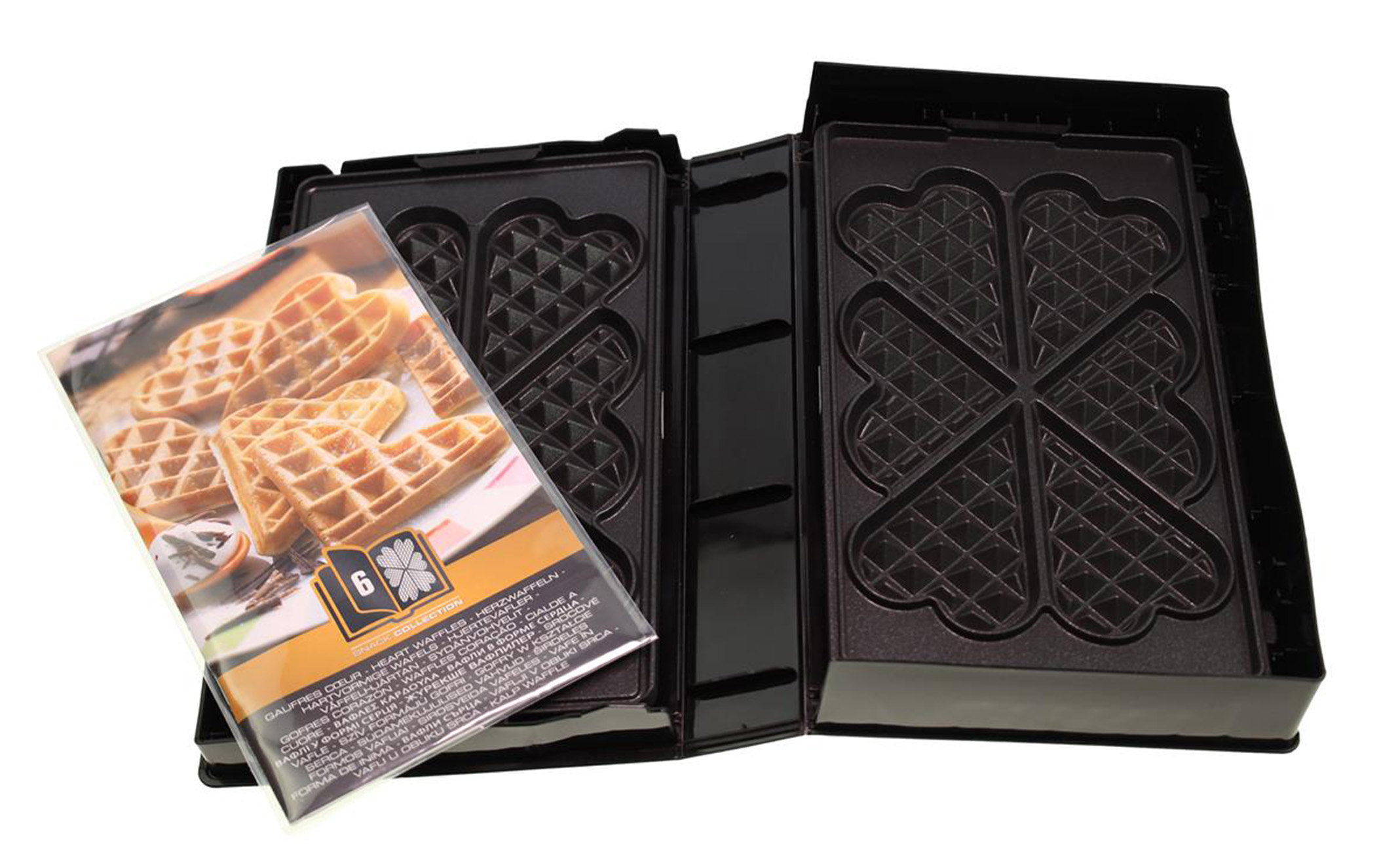 Ein Waffeleisen mit herzförmigen Formen und einem Heft mit Herzwaffeln. Die Maschine ist schwarz.