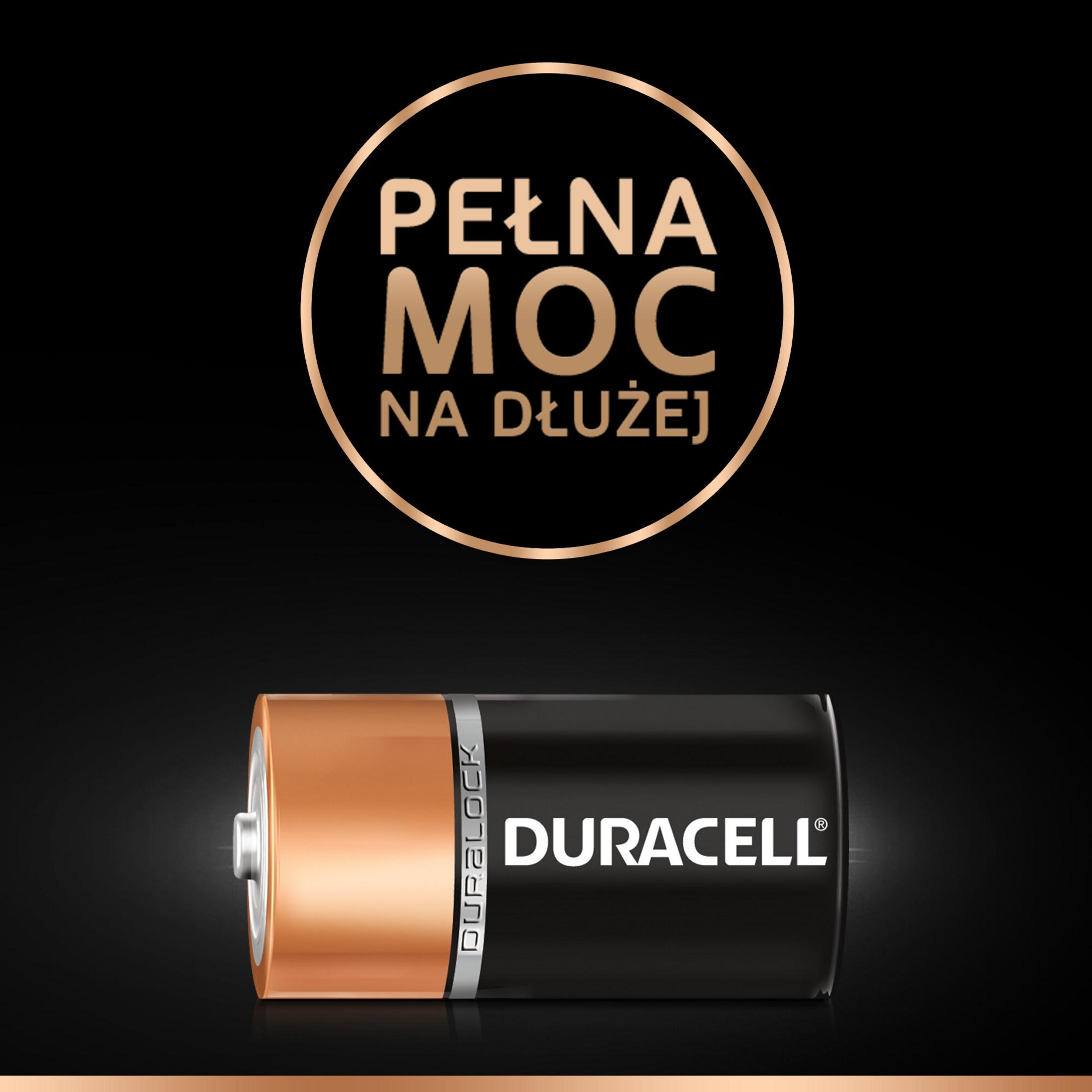 Bateria Duracell z miedzianym wierzchem i czarnym korpusem, z polskim tekstem. Czarne tło z miedzianym paskiem na dole.