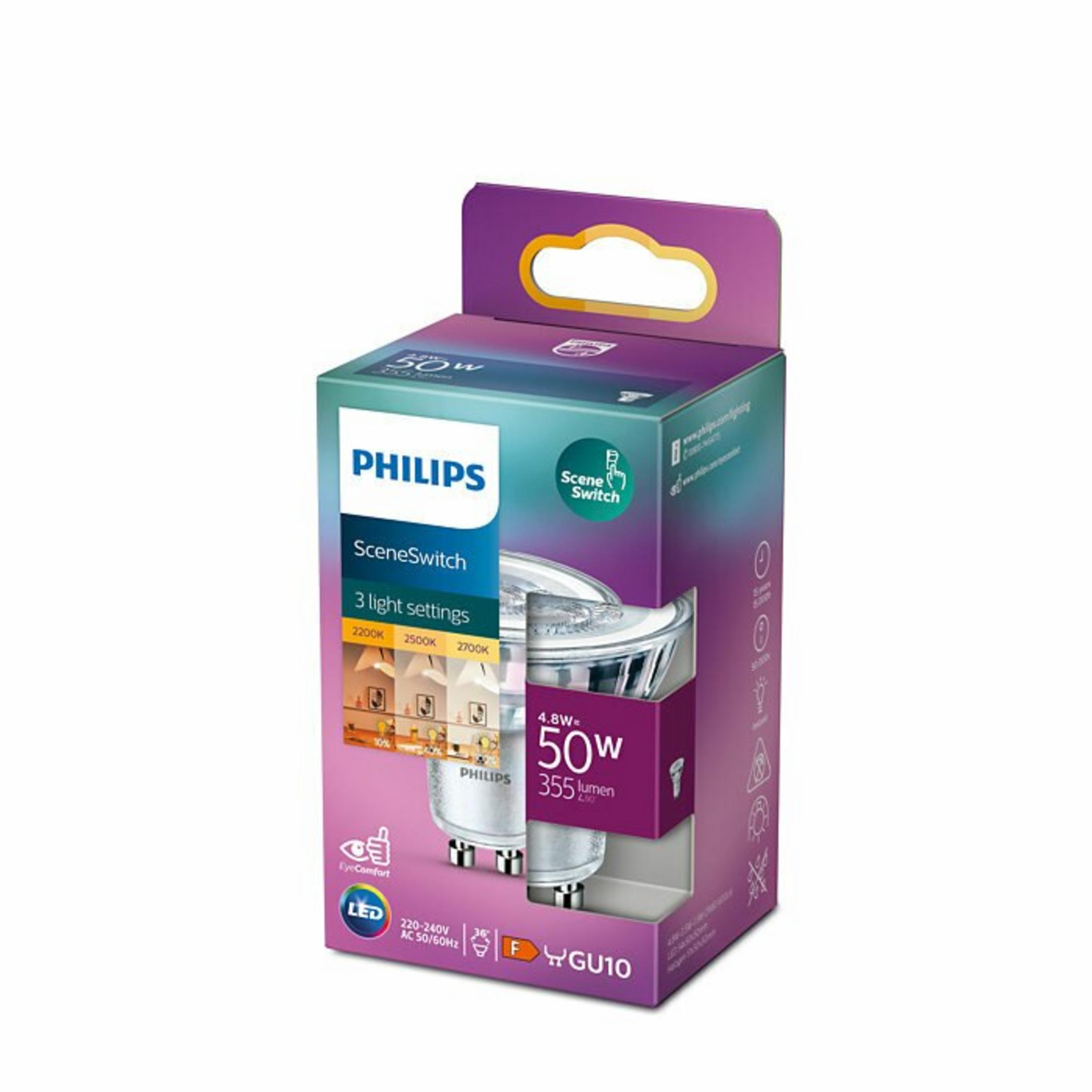 Faretto LED Philips in scatola. Colori verde e viola. Il testo include 'SceneSwitch', '50W' e 'GU10'.