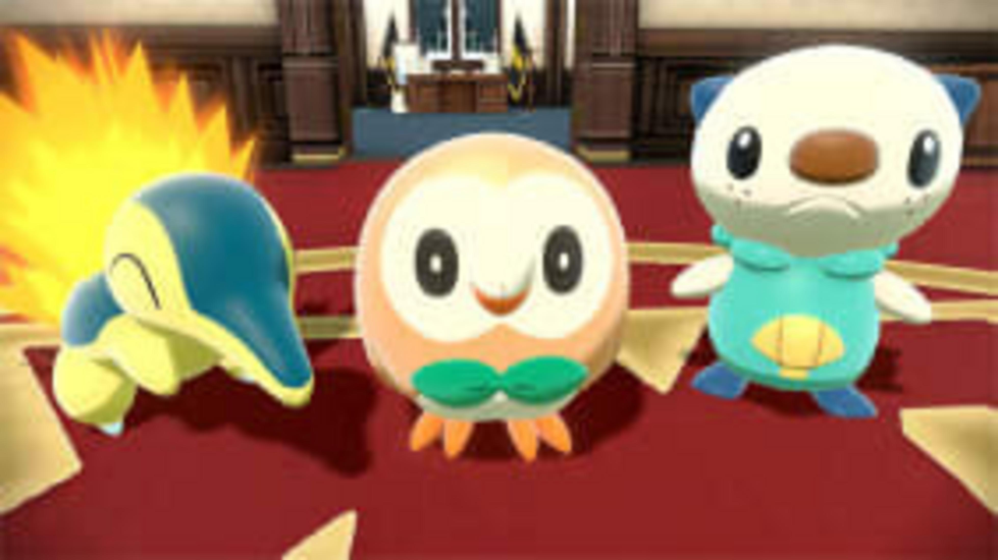 Tre Pokémon: Cyndaquil con fiamme, Rowlet con papillon e Oshawott. Sono su un tappeto rosso in una stanza.