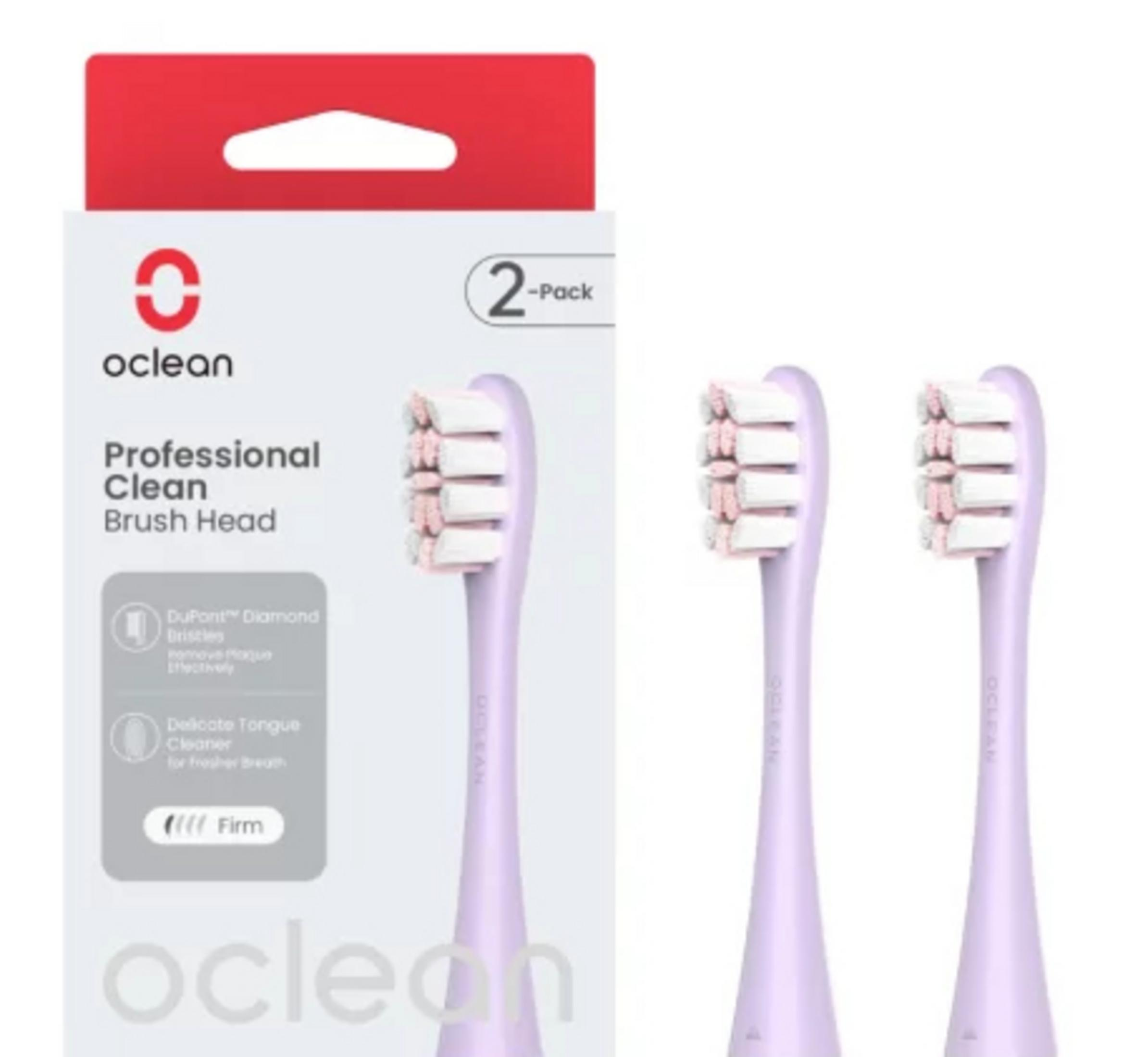 Eine Schachtel mit Oclean Professional Clean Bürstenköpfen. Es sind zwei hellviolette Bürstenköpfe mit weißen und rosa Borsten abgebildet.