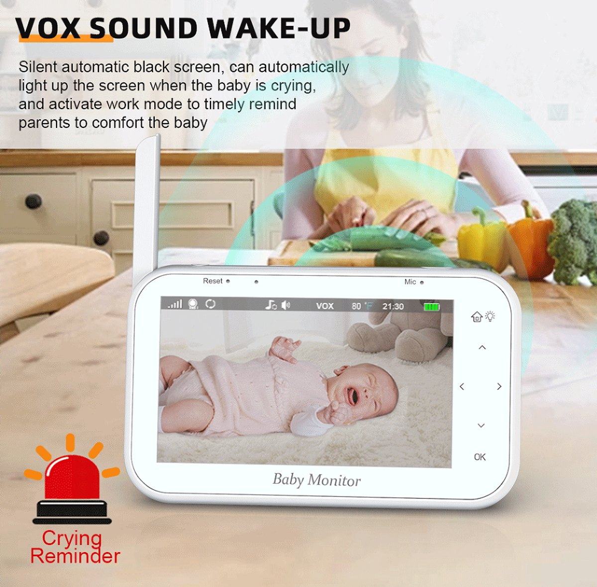 Ein Babyphone zeigt ein weinendes Baby. Text sagt 'Weinerinnerung'. Eine Frau im Hintergrund ist in der Nähe von Gemüse.