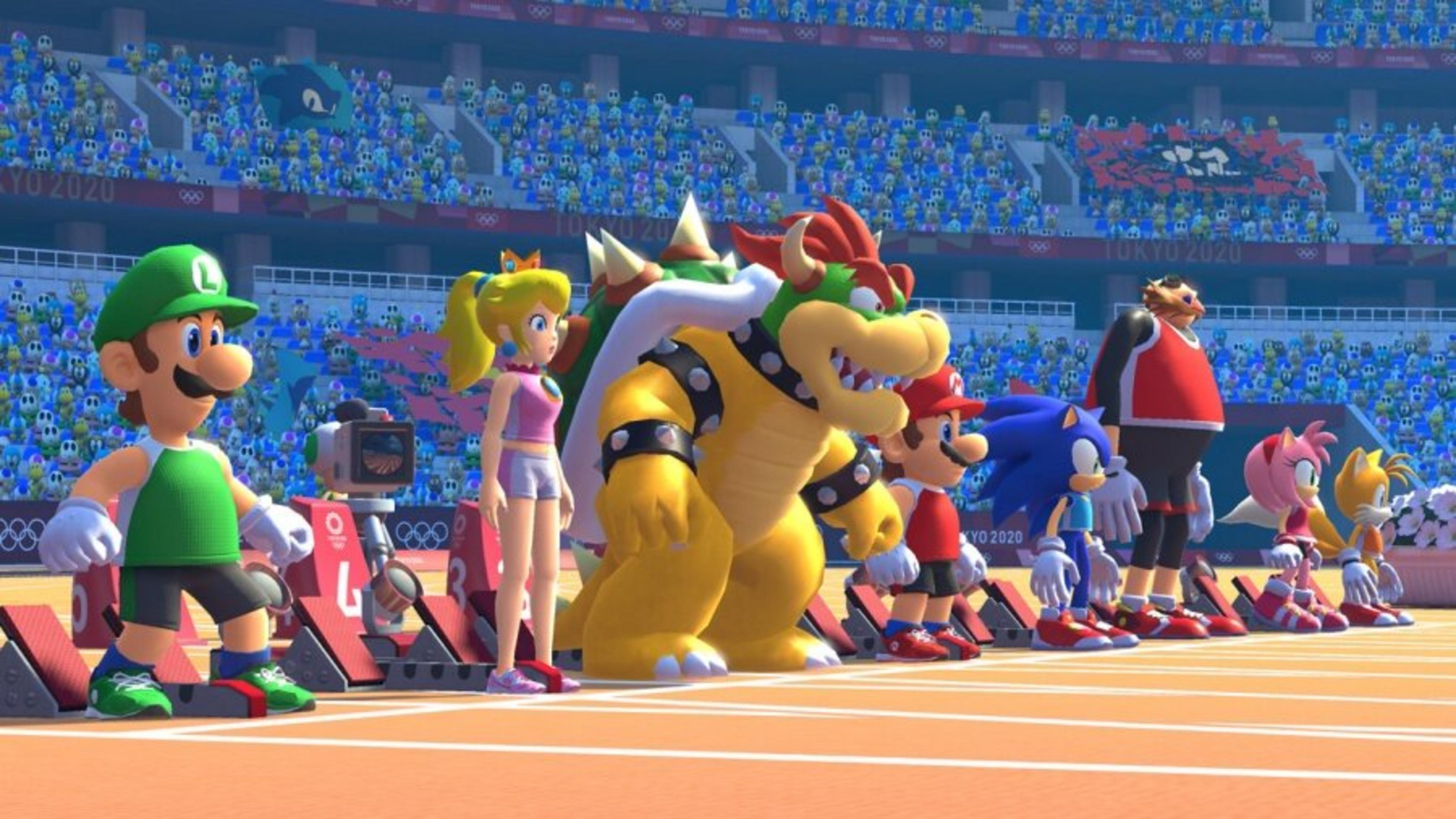Personajes como Luigi, Mario, Bowser y Sonic en un evento de atletismo, frente a un estadio lleno de espectadores.