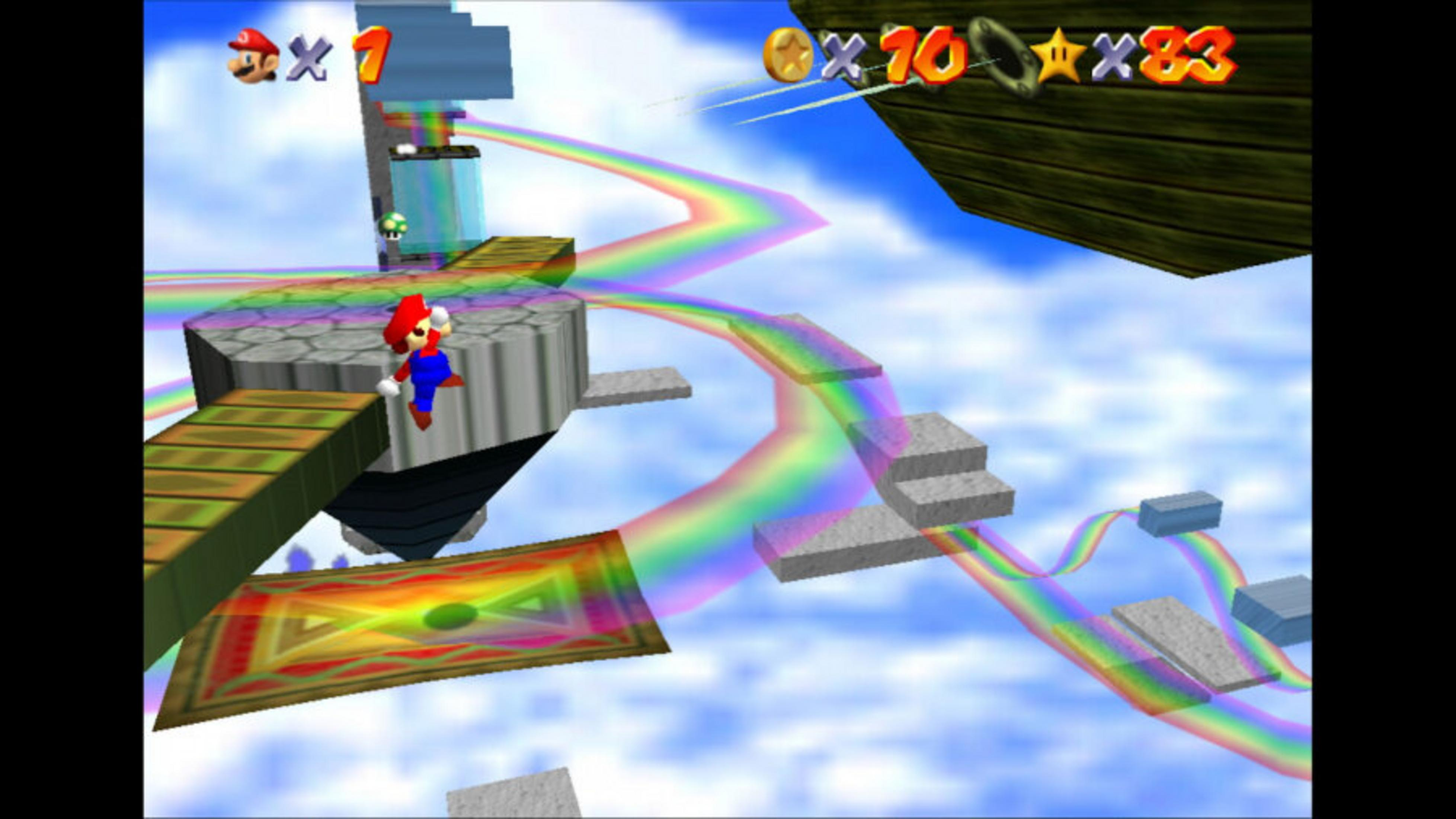 Mario in un livello di Super Mario 64. Percorso arcobaleno, piattaforme fluttuanti e cielo blu. Monete e stelle visibili.