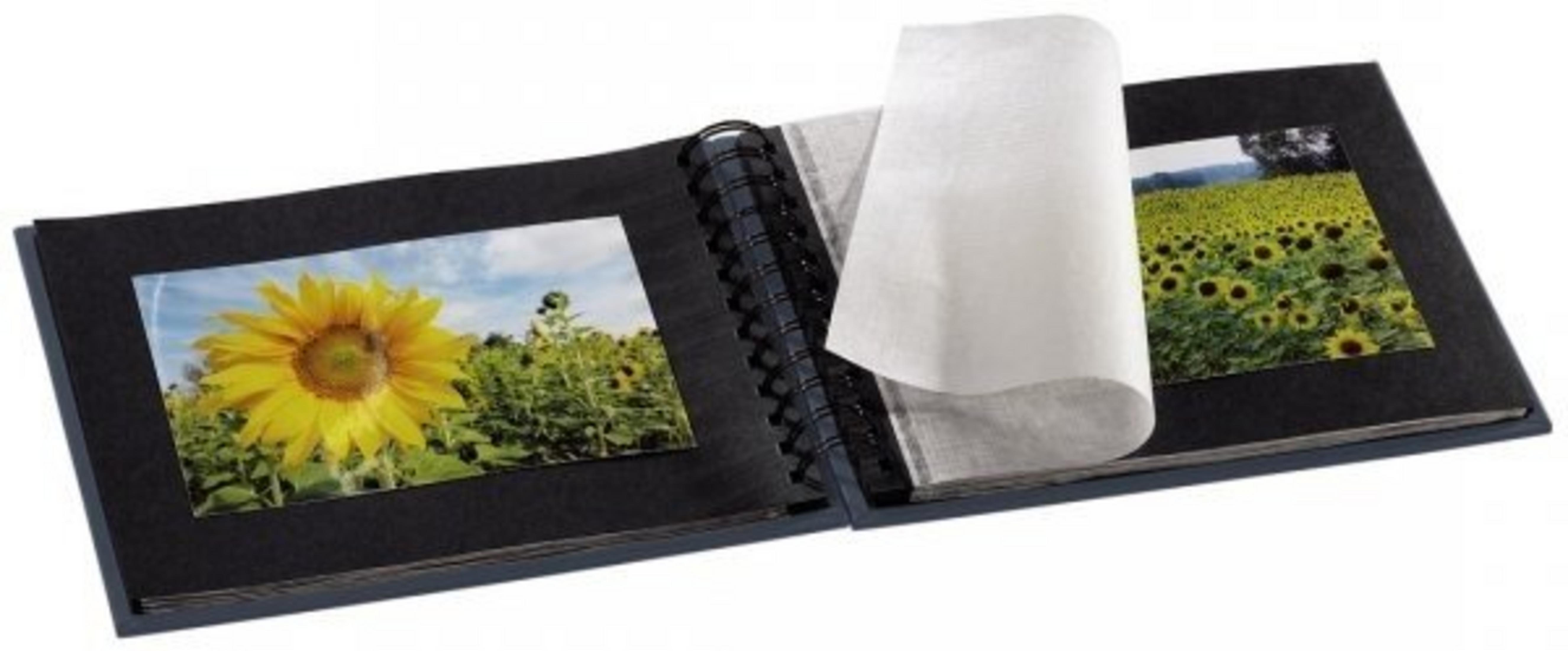 Otwarty album ze zdjęciami słoneczników. Żółte słoneczniki na polach i zbliżenia. Tło błękitnego nieba. Album ma czarne strony.