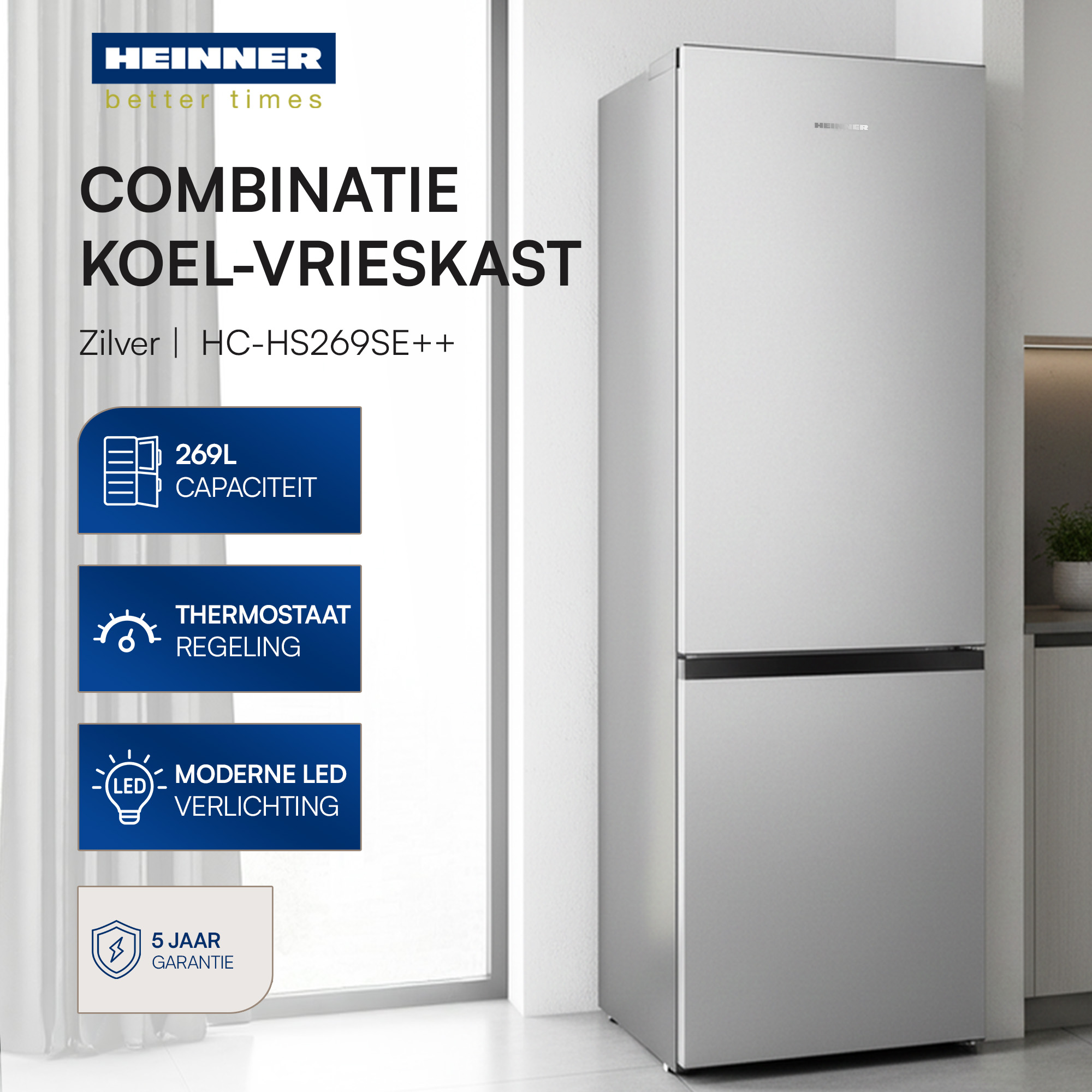 A silver Heinner fridge-freezer. Features include 269L capacity, thermostat control, modern LED lighting, and a 5-year guarantee.
