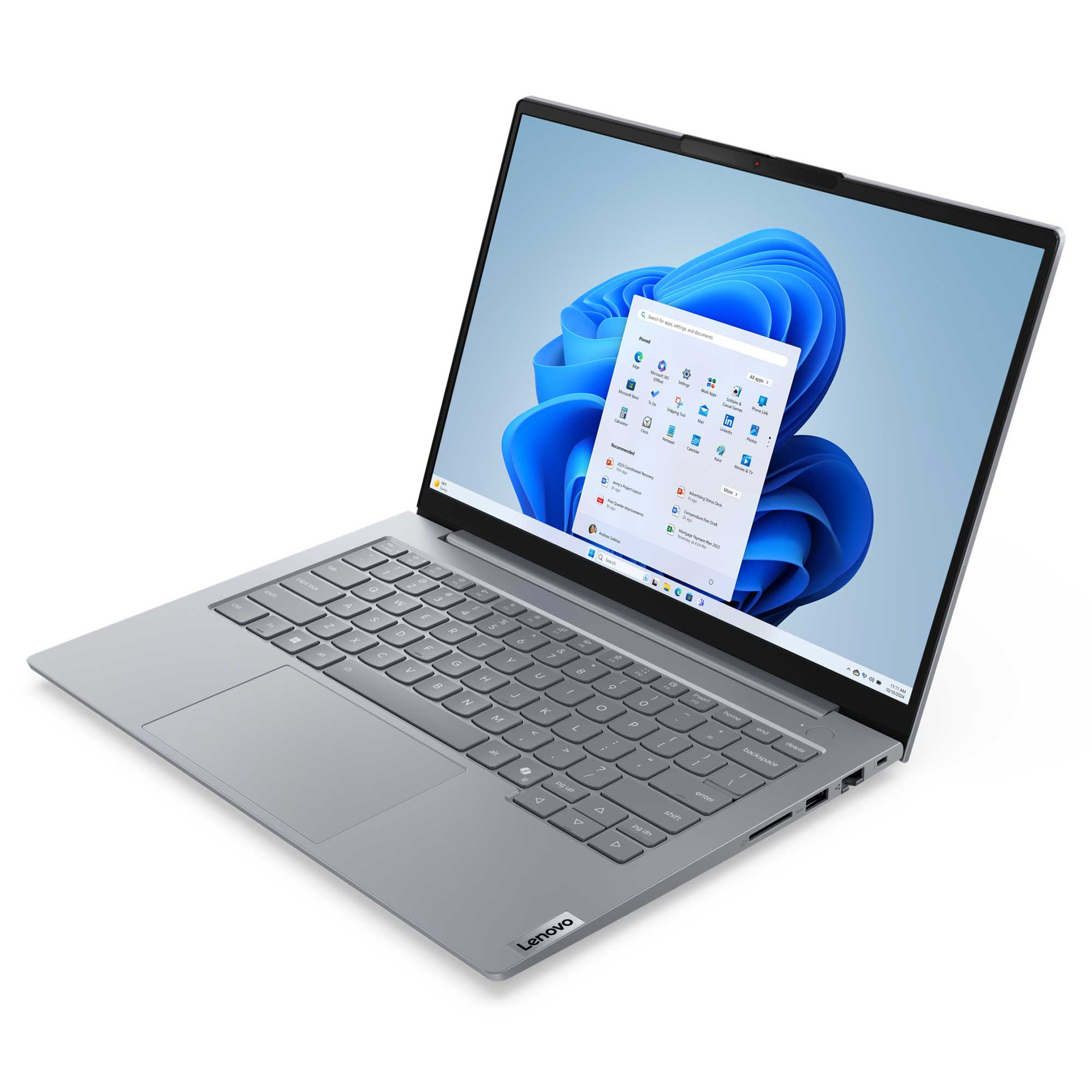 Bir Lenovo dizüstü bilgisayar açık, Windows 11 arayüzünü gösteriyor. Klavye görünür ve ekran uygulama simgelerini gösteriyor.