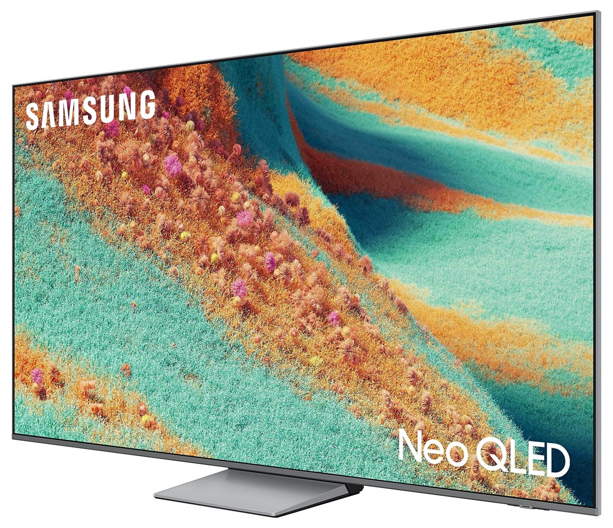 Telewizor Samsung Neo QLED. Ekran wyświetla abstrakcyjną sztukę w odcieniach pomarańczu, zieleni i różu. Telewizor stoi na srebrnej podstawie.