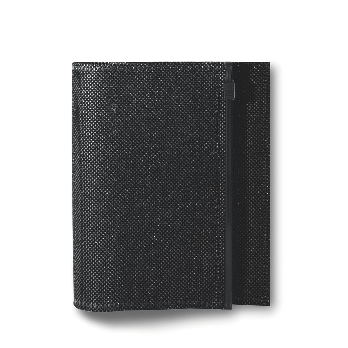A textured black notebook lies open on a white surface. A black zipper runs down the side, and the pages are visible.