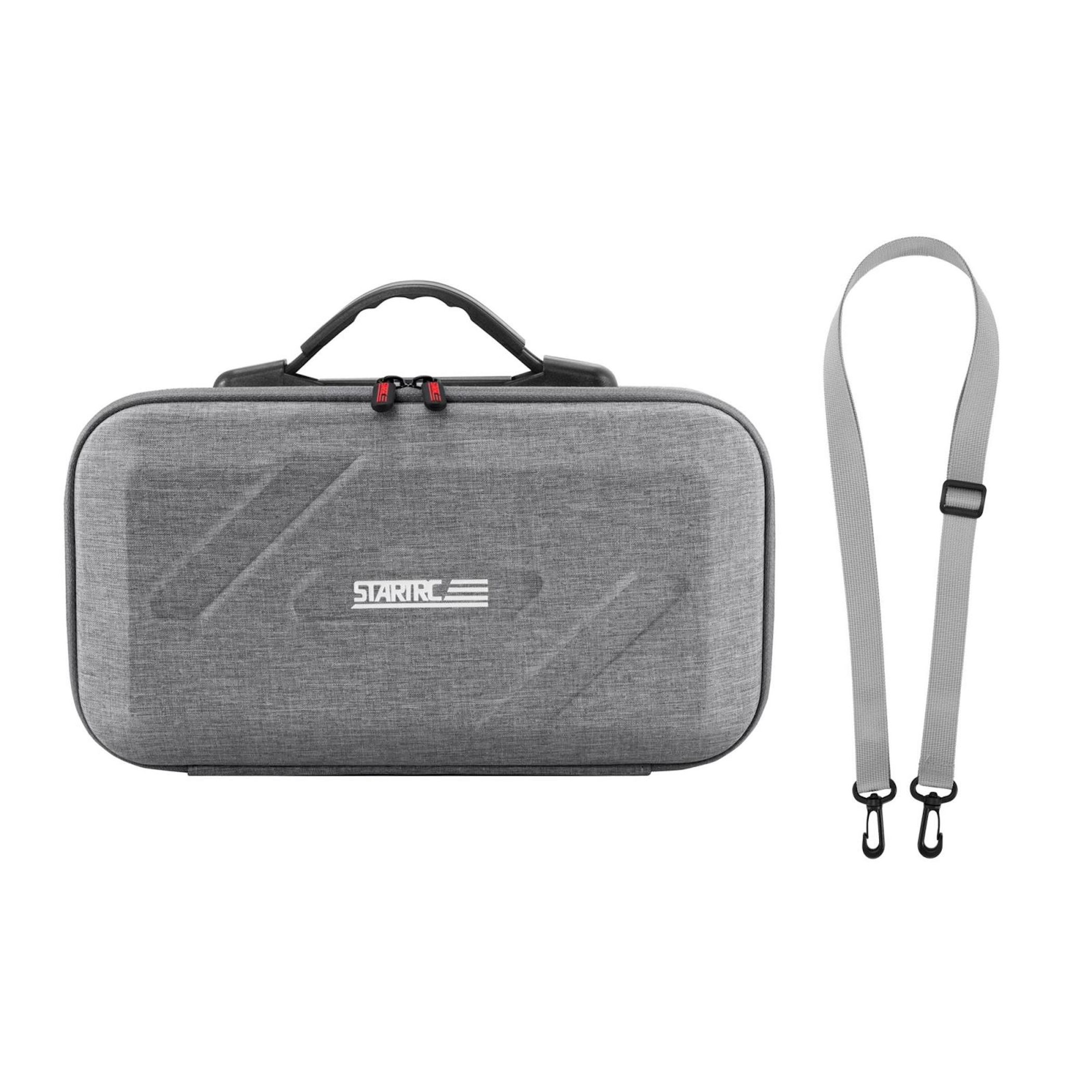 Graue rechteckige Tasche mit Griff und Schultergurt auf weißem Hintergrund.