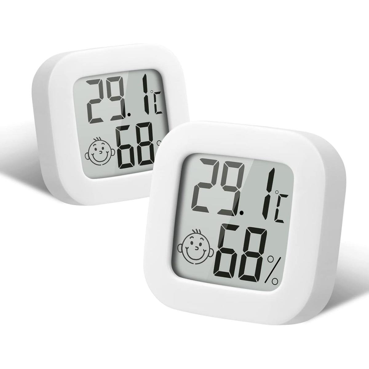 Zwei weiße Digitalthermometer mit abgerundeten Ecken zeigen die Temperatur als 29,1 °C und die Luftfeuchtigkeit als 68 % an.