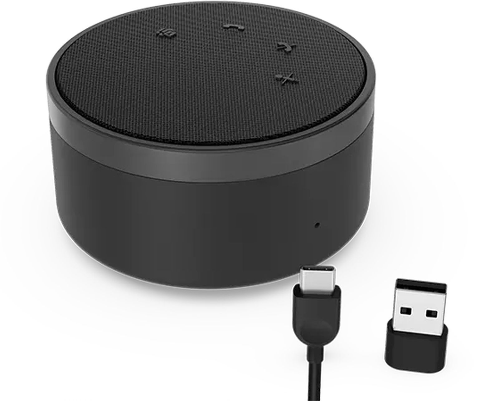 Un altoparlante intelligente nero con parte superiore in rete, un cavo USB-C e un adattatore USB sono su una superficie bianca.