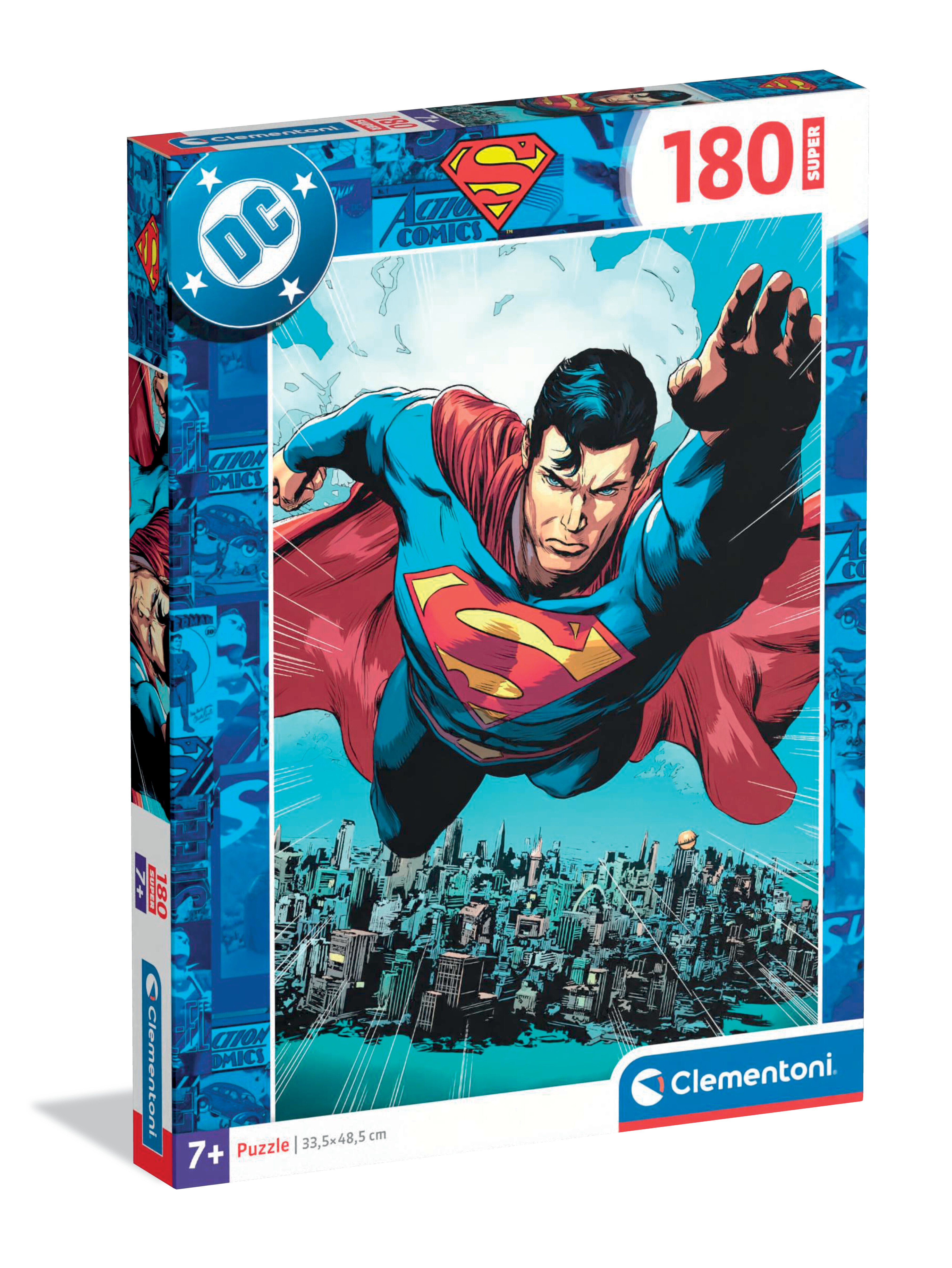 Boîte de puzzle Superman. Superman vole au-dessus d'une ville, portant un costume bleu avec une cape et un logo rouges.