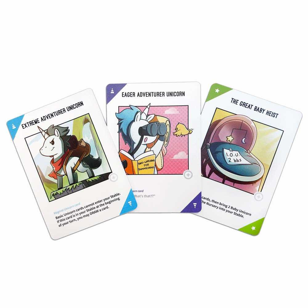 Tre carte del gioco degli unicorni: Avventuriero Estremo, Avventuriero Desideroso e Il Grande Colpo dei Bambini.