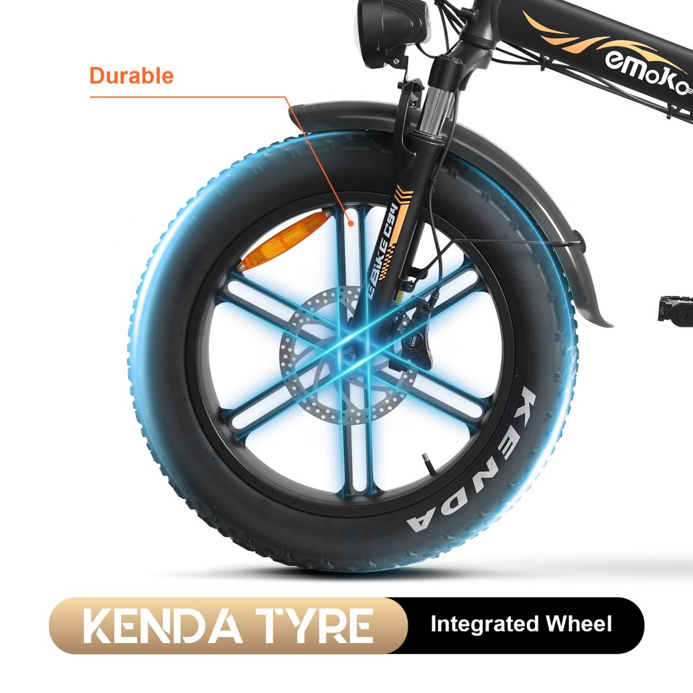 Primer plano de una rueda de bicicleta eléctrica negra con un neumático Kenda. La rueda tiene un freno de disco y está marcada como "Durable".