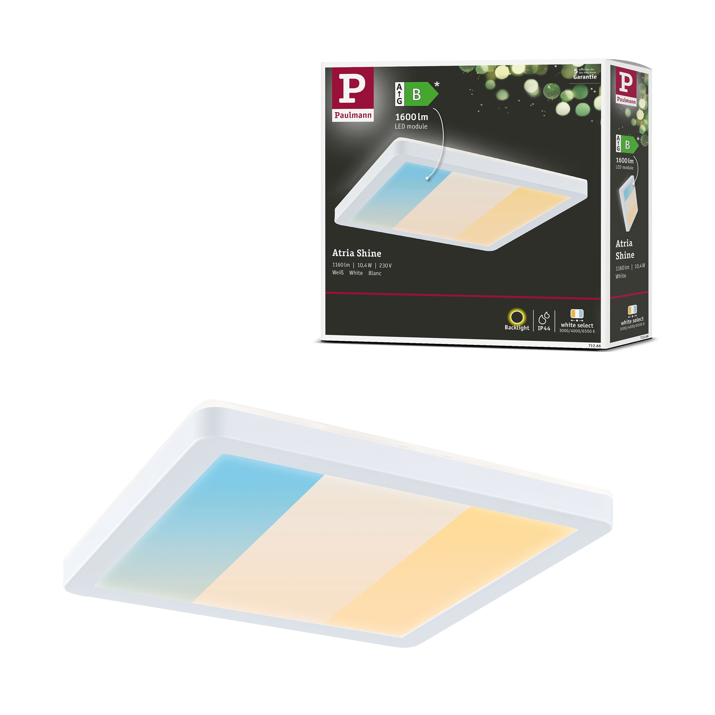 Biała kwadratowa lampa z niebieskimi, beżowymi i żółtymi sekcjami światła. Widoczne opakowanie z tekstem.