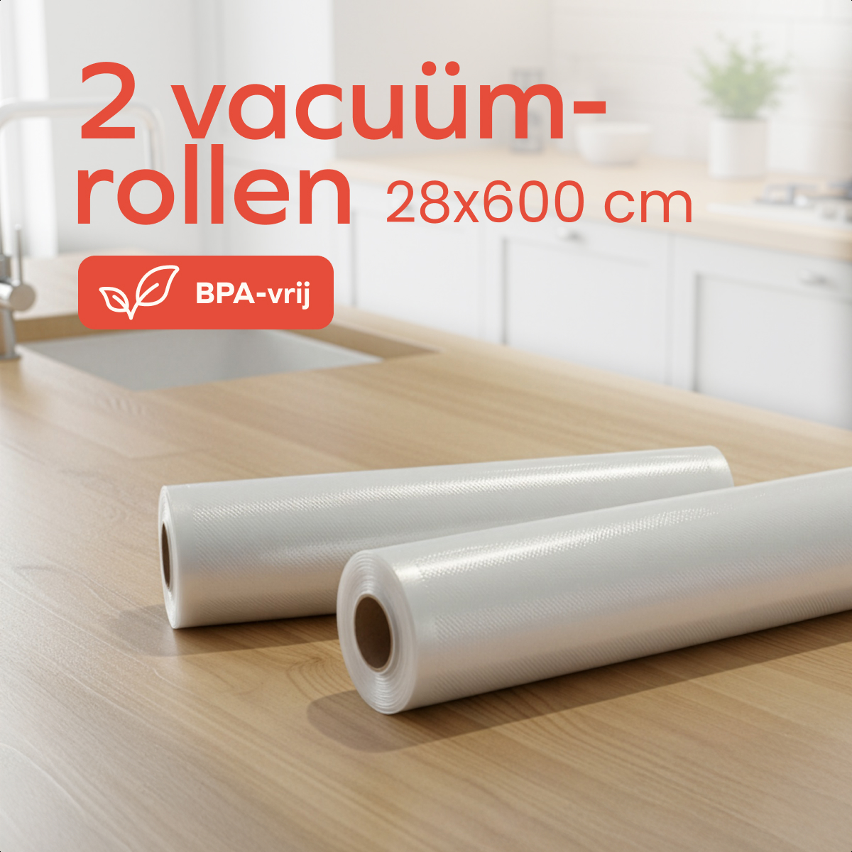 Two vacuum rolls on a wooden countertop. Text: 2 vacuum-rollen 28x600 cm.  BPA-vrij icon. Background: kitchen, sink, plant.