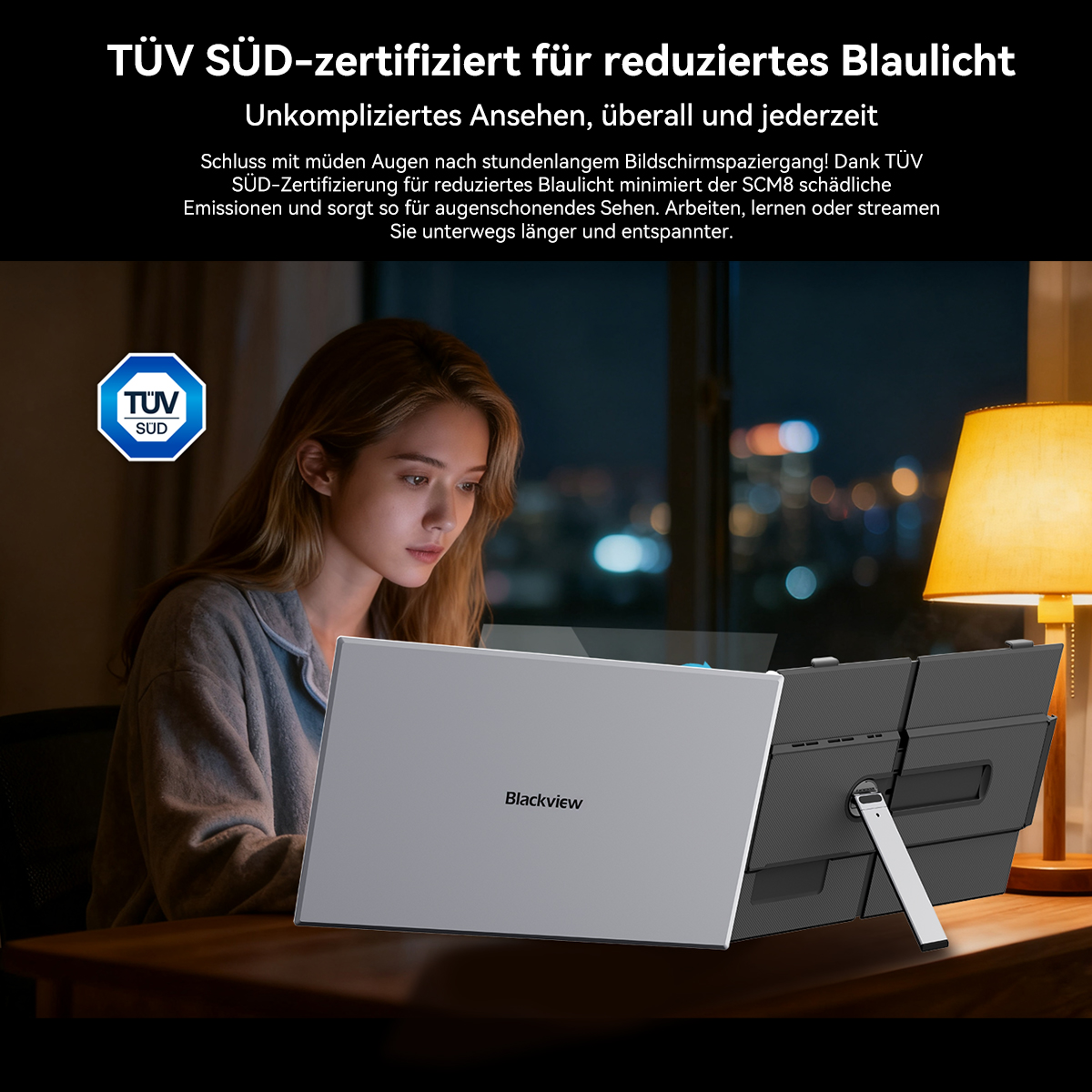 Eine Frau schaut auf einen Laptop mit Displayschutz. Eine Lampe und ein Fenster sind sichtbar. Der Laptop hat die Marke Blackview.
