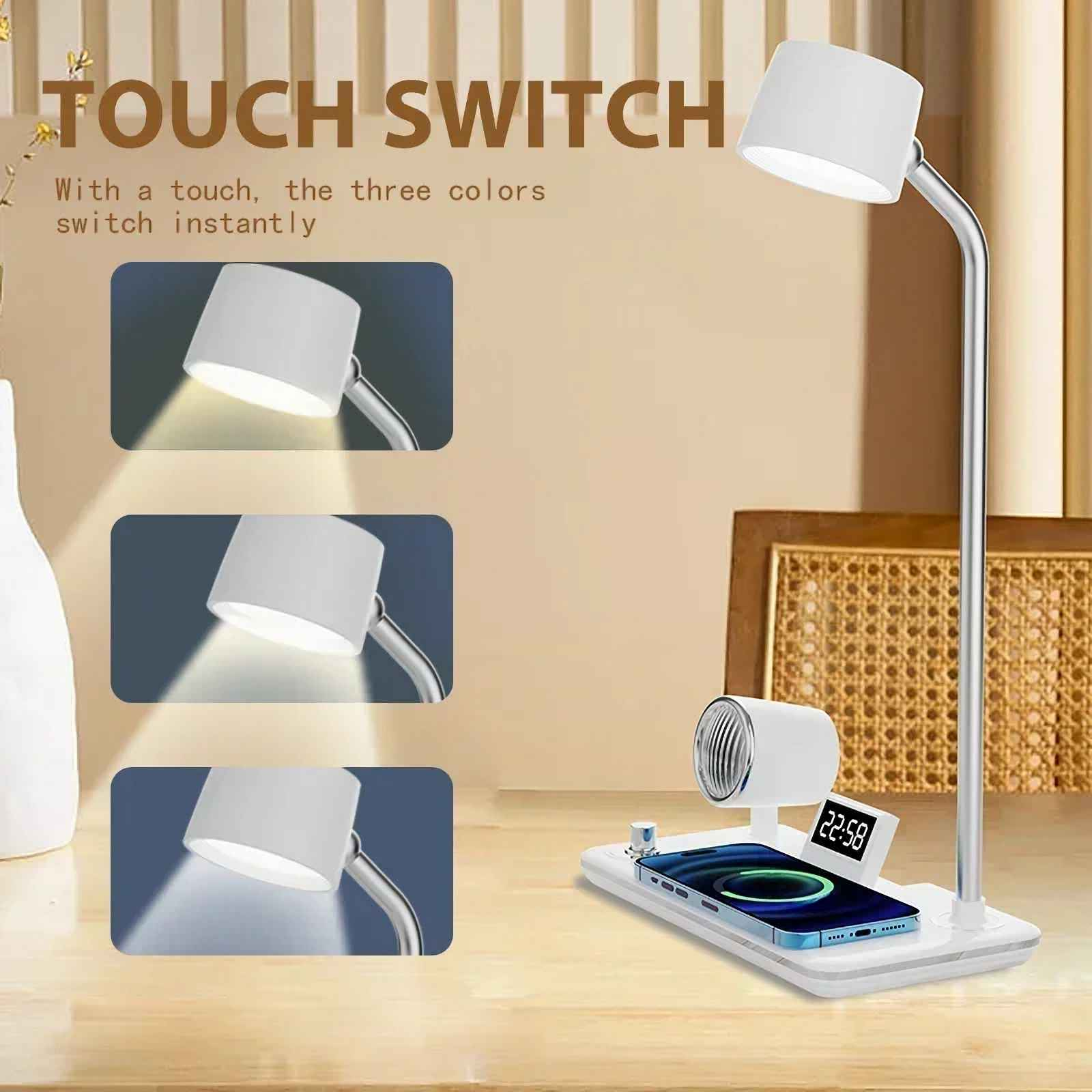 Eine weiße Schreibtischlampe mit Ladestation und Telefon steht auf einer Holzoberfläche. Der Text lautet 'Touch Switch'.