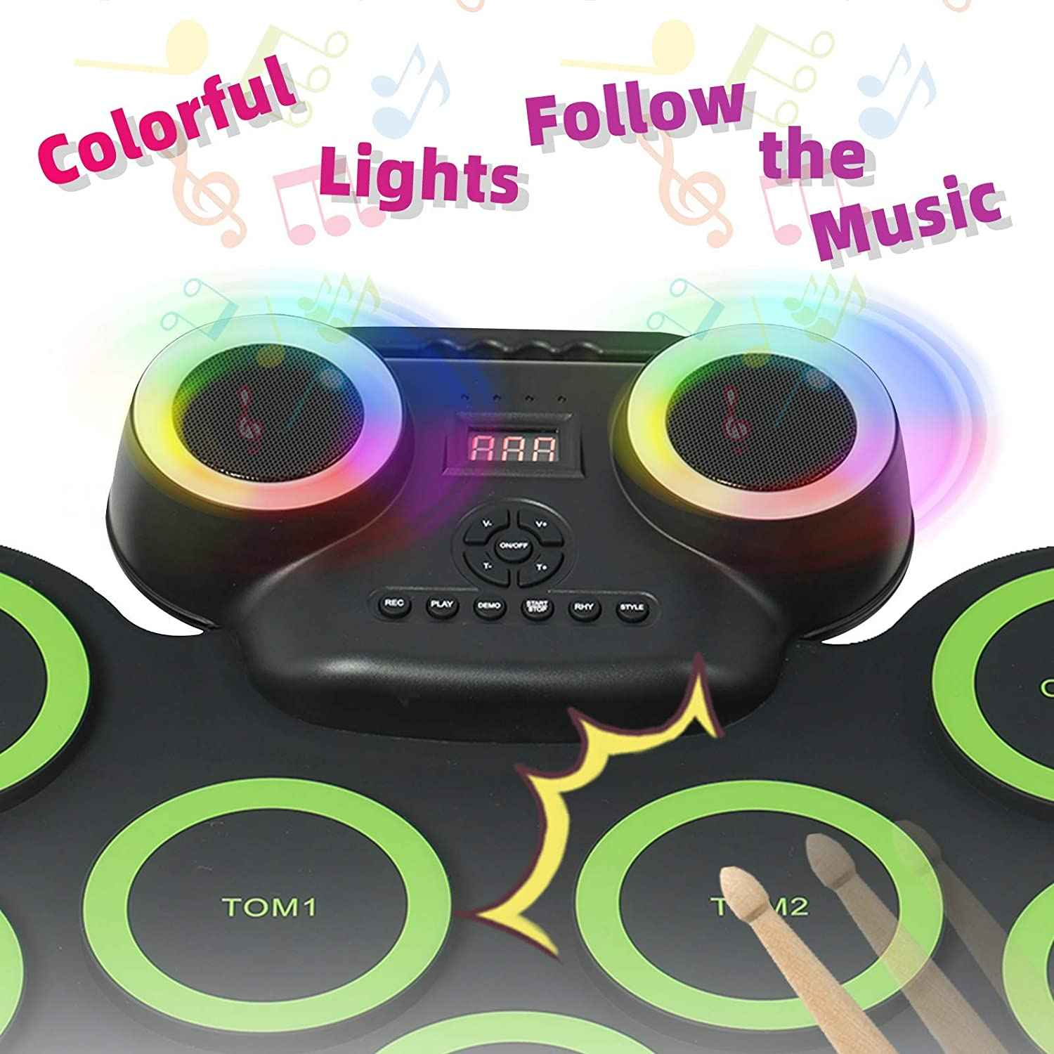 Ein Schlagzeug mit bunten Lichtern und Noten. Der Text auf dem Bild lautet: Bunte Lichter, Folge der Musik.