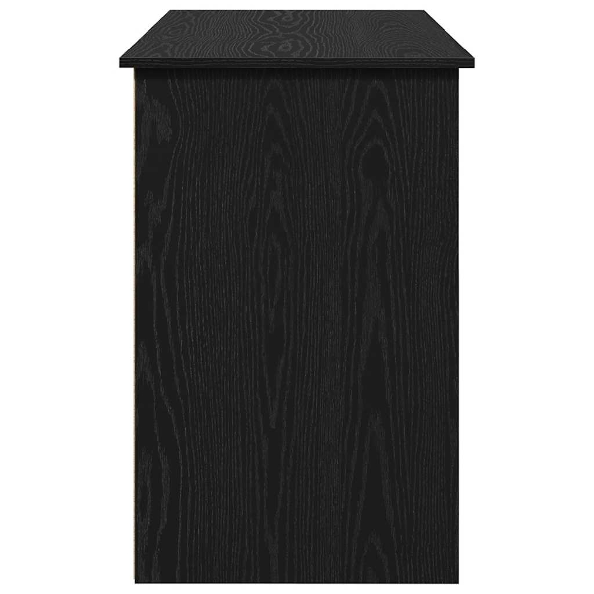 Nahaufnahme eines schwarzen Holzschranks mit sichtbarer Holzmaserung. Die Oberseite ist flach. Die Seite scheint eine hellere Farbe zu haben.