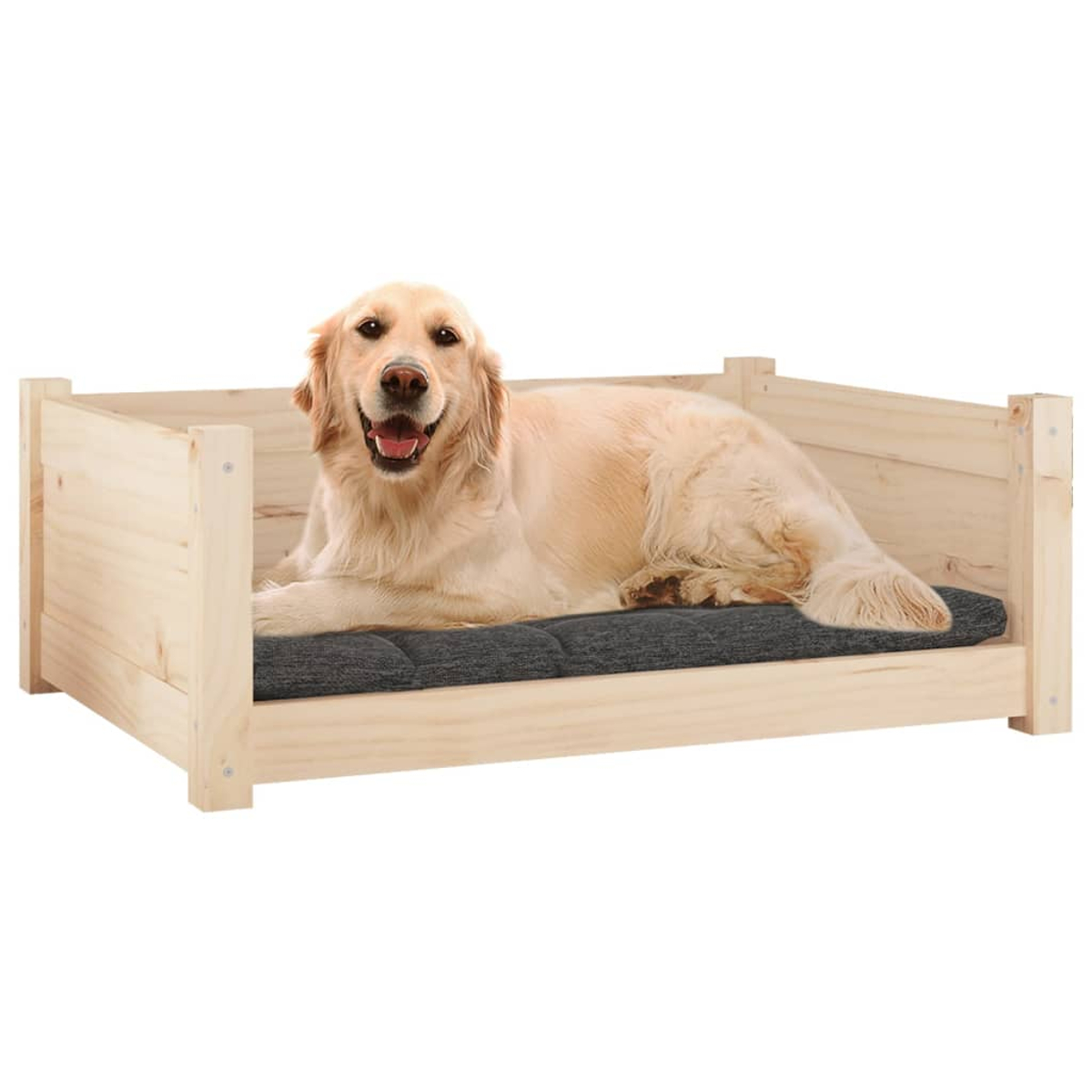 Ein Golden Retriever liegt in einem Hundebett aus Holz. Der Hund lächelt. Das Bett hat ein graues Kissen.