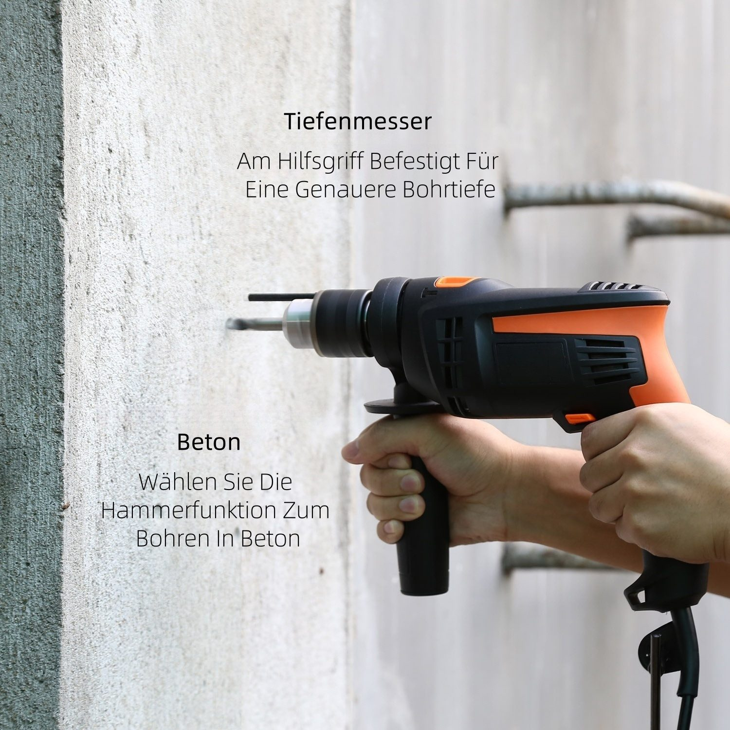 Eine Person benutzt einen schwarz-orangenen Bohrer, um in eine Betonwand zu bohren. Der Bohrer ist an der Wand positioniert.