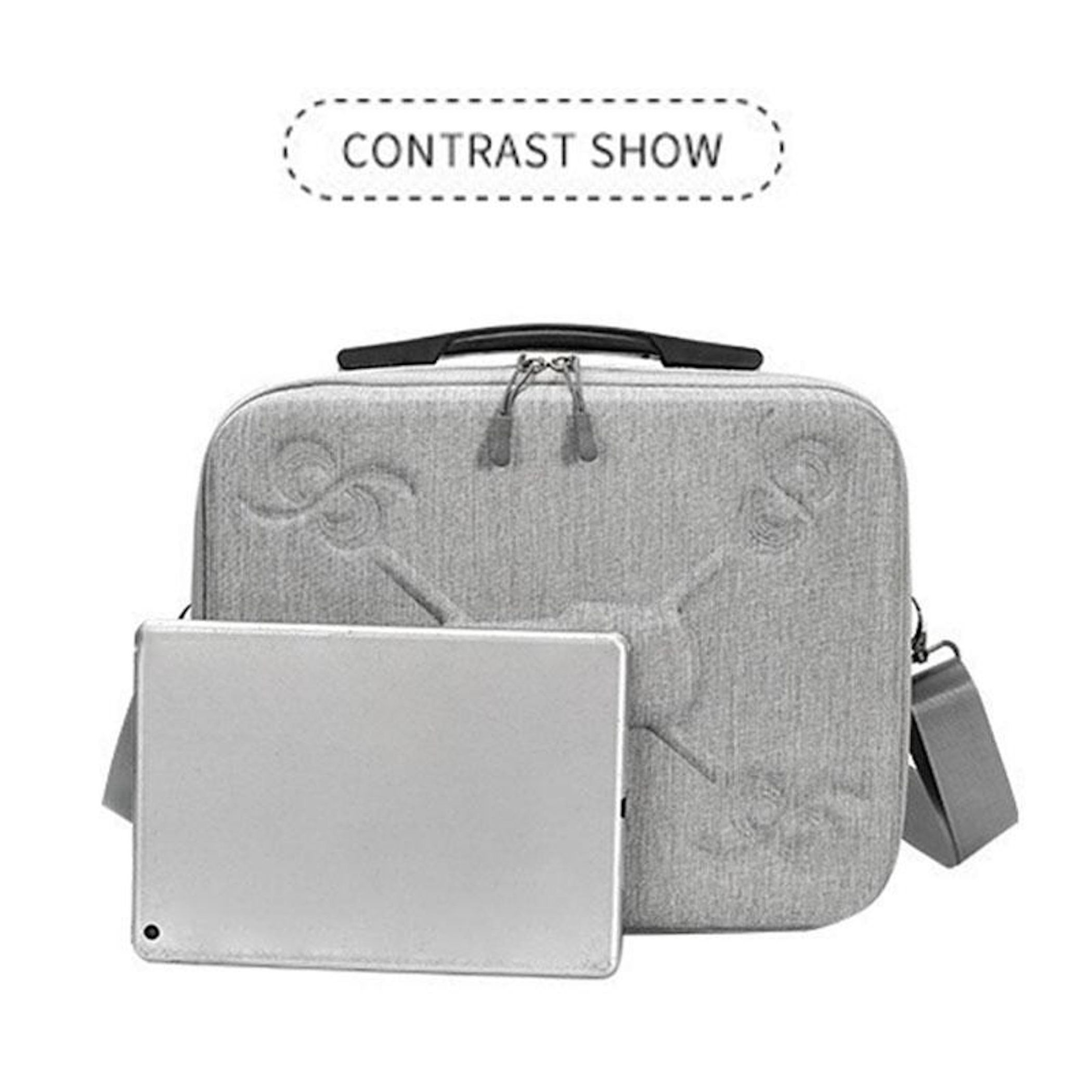 Graue Drohnen-Tragetasche mit Tablet davor. Der Text 'CONTRAST SHOW' befindet sich oben.