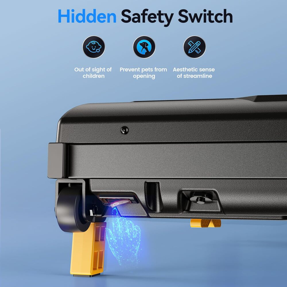 Nahaufnahme eines schwarzen Geräts mit gelber Komponente. Text oben: 'Hidden Safety Switch'. Symbole mit Text darunter: 'Out of sight of children'.