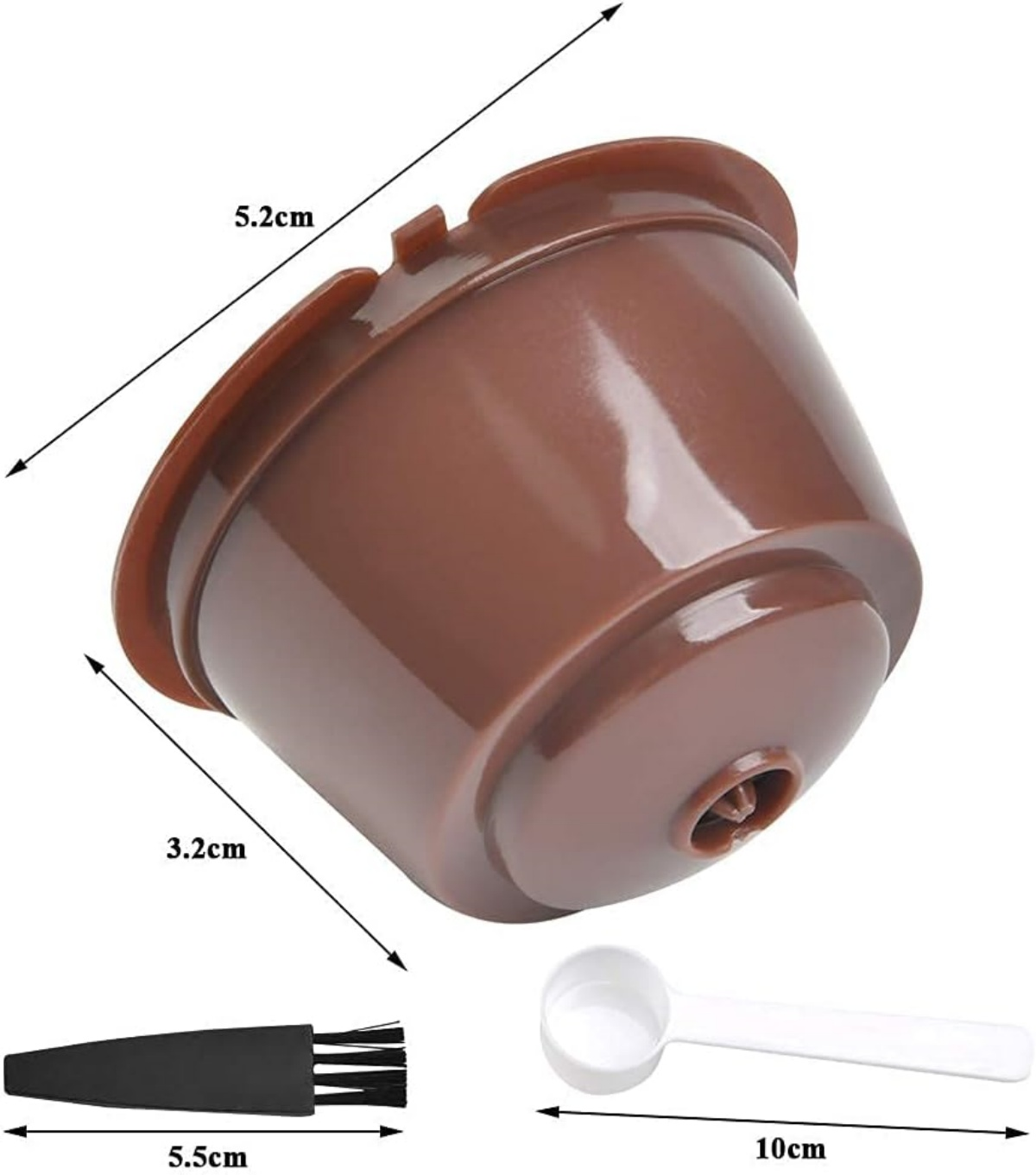 Eine braune Kaffeekapsel, eine schwarze Reinigungsbürste und ein weißer Messlöffel. Abmessungen sind angegeben.