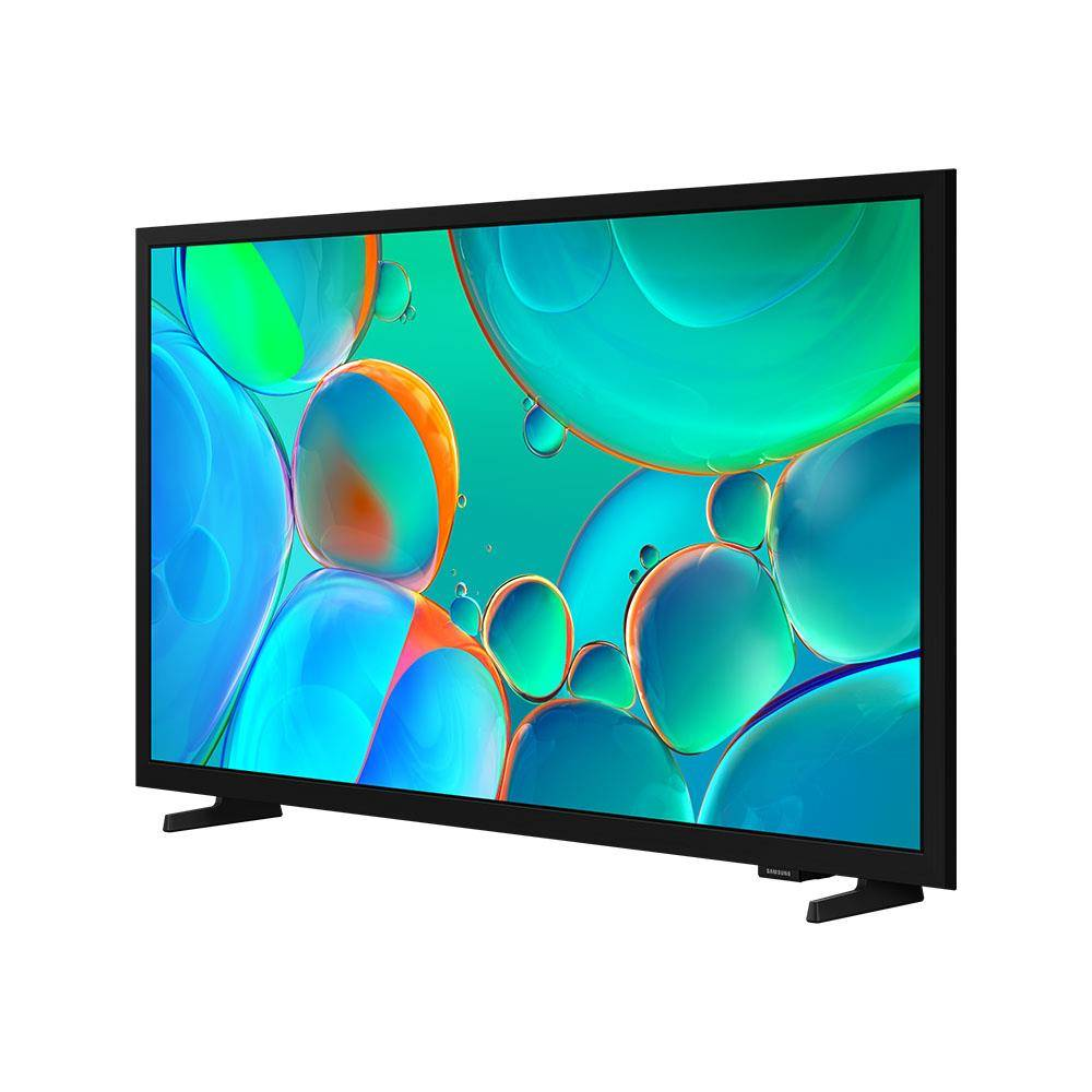 Mavi ve yeşil kabarcık benzeri şekillerden oluşan bir ekran gösteren bir Samsung TV. TV siyah renkte ve iki siyah ayak üzerinde duruyor.