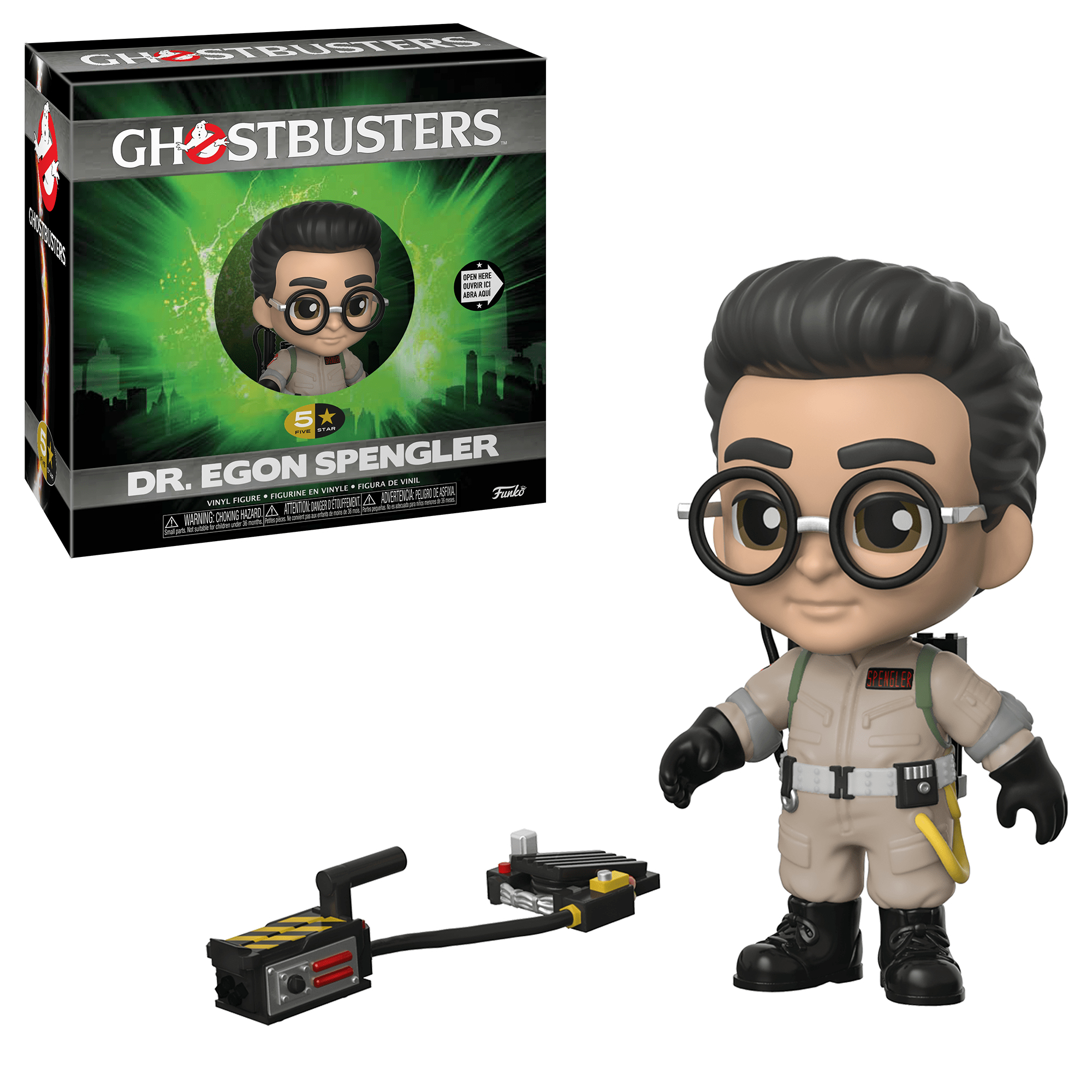 Una figura e scatola di Dr. Egon Spengler di Ghostbusters. La figura indossa una tuta, occhiali e tiene in mano un pacco protonico. È presente una trappola per fantasmi.