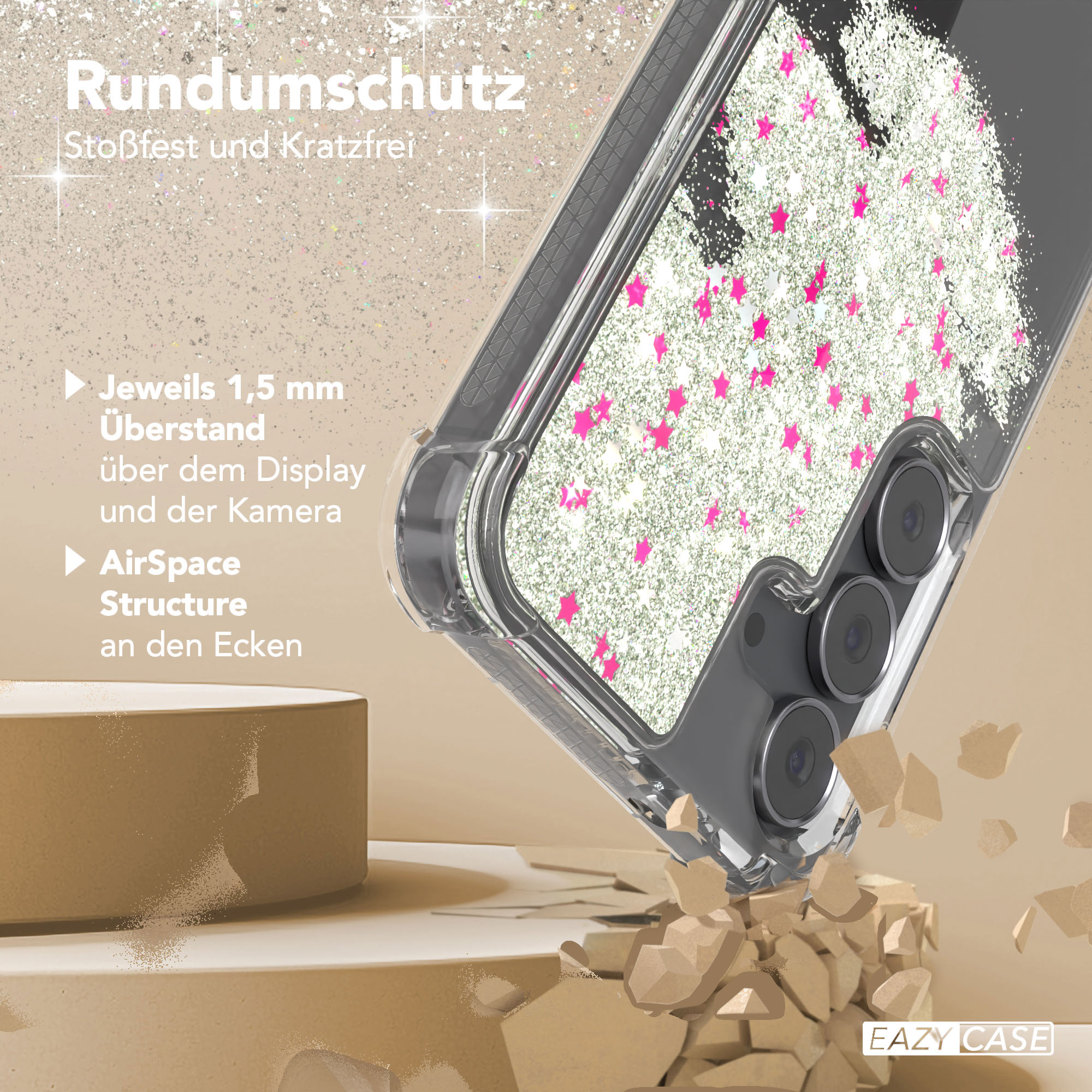 Eine Handyhülle mit Glitzer und pinkfarbenen Sternen. Die Hülle ist klar und das Telefon grau. Zerbrochene Blöcke liegen am Boden.