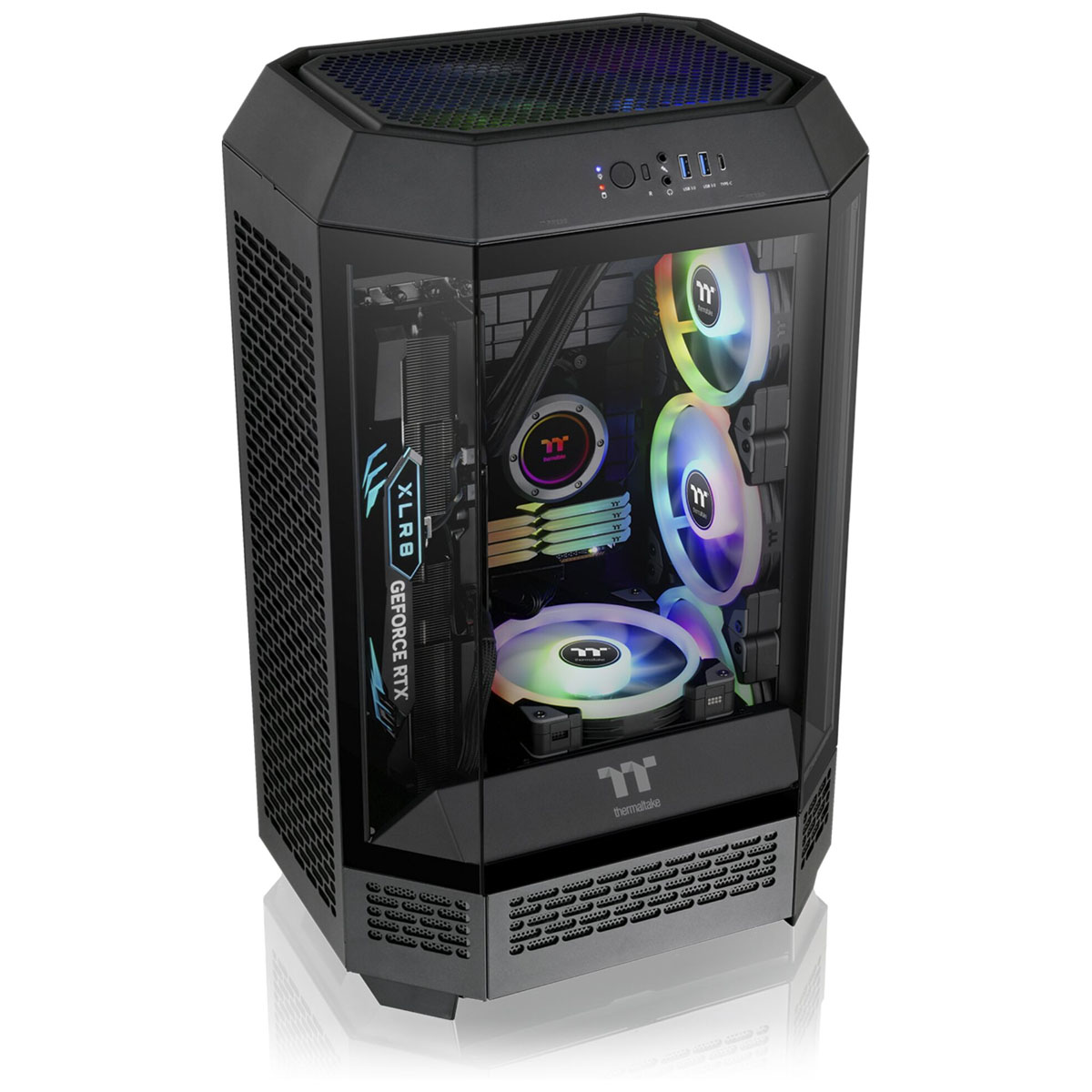 Black computer case with glass panels. Inside, a graphics card, fans with rainbow lights, and Thermaltake branding are visible.