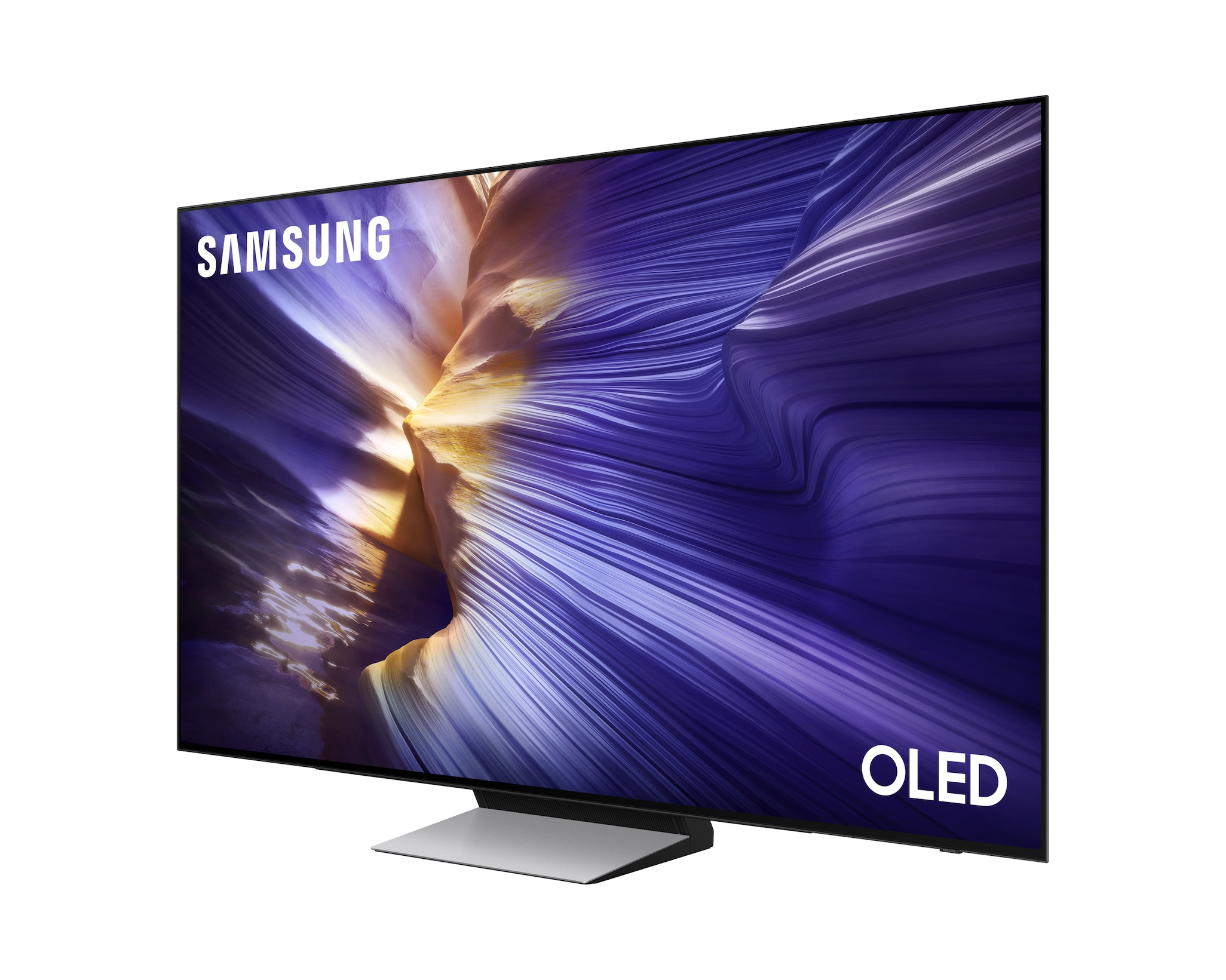 Un televisore Samsung OLED mostra un'immagine astratta colorata. Lo schermo ha una cornice nera. Il supporto è argentato.