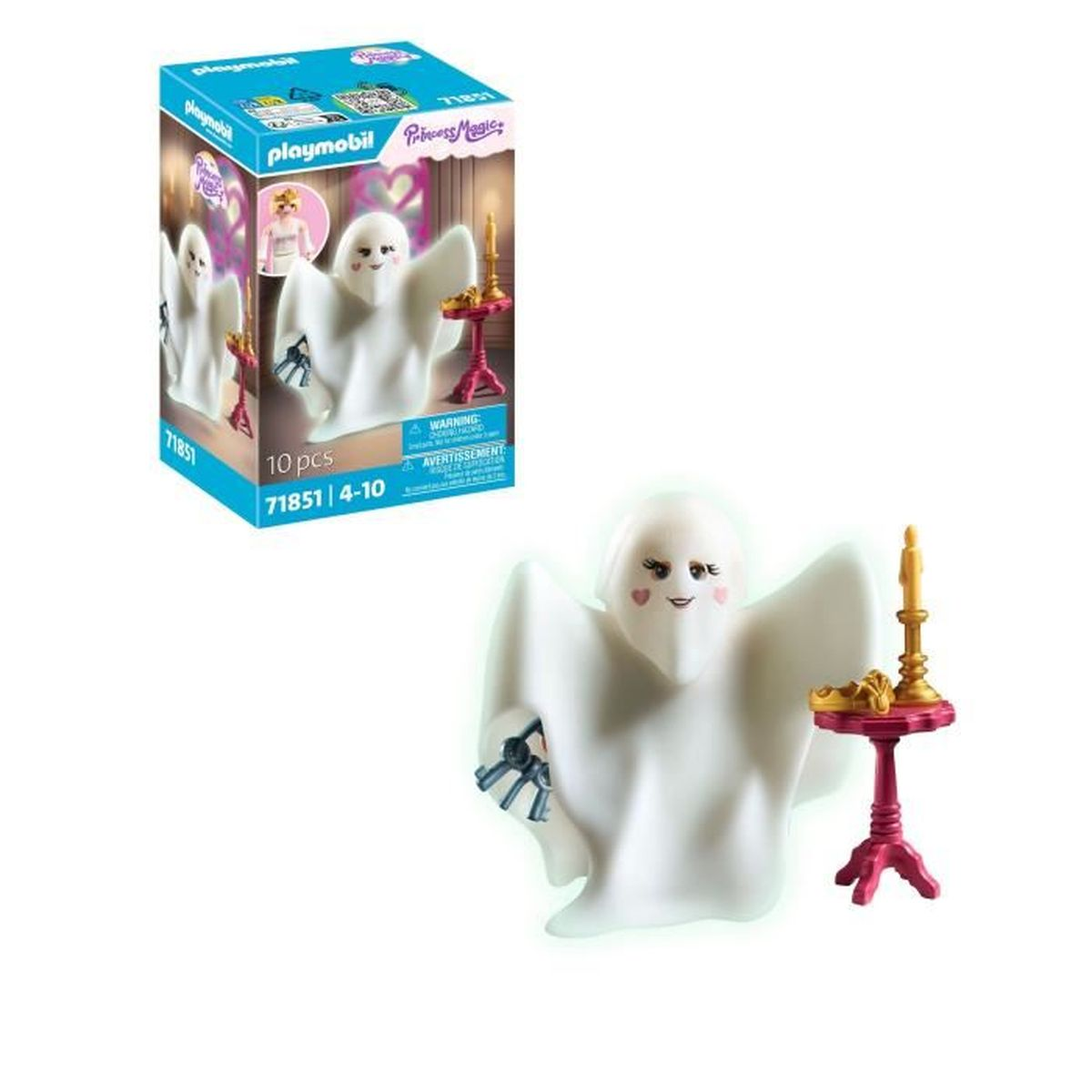 Een wit speelgoed spook met een vriendelijk gezicht, kleine sleutels en een kaars op een roze tafel. Een doos met hetzelfde spook staat op de achtergrond.