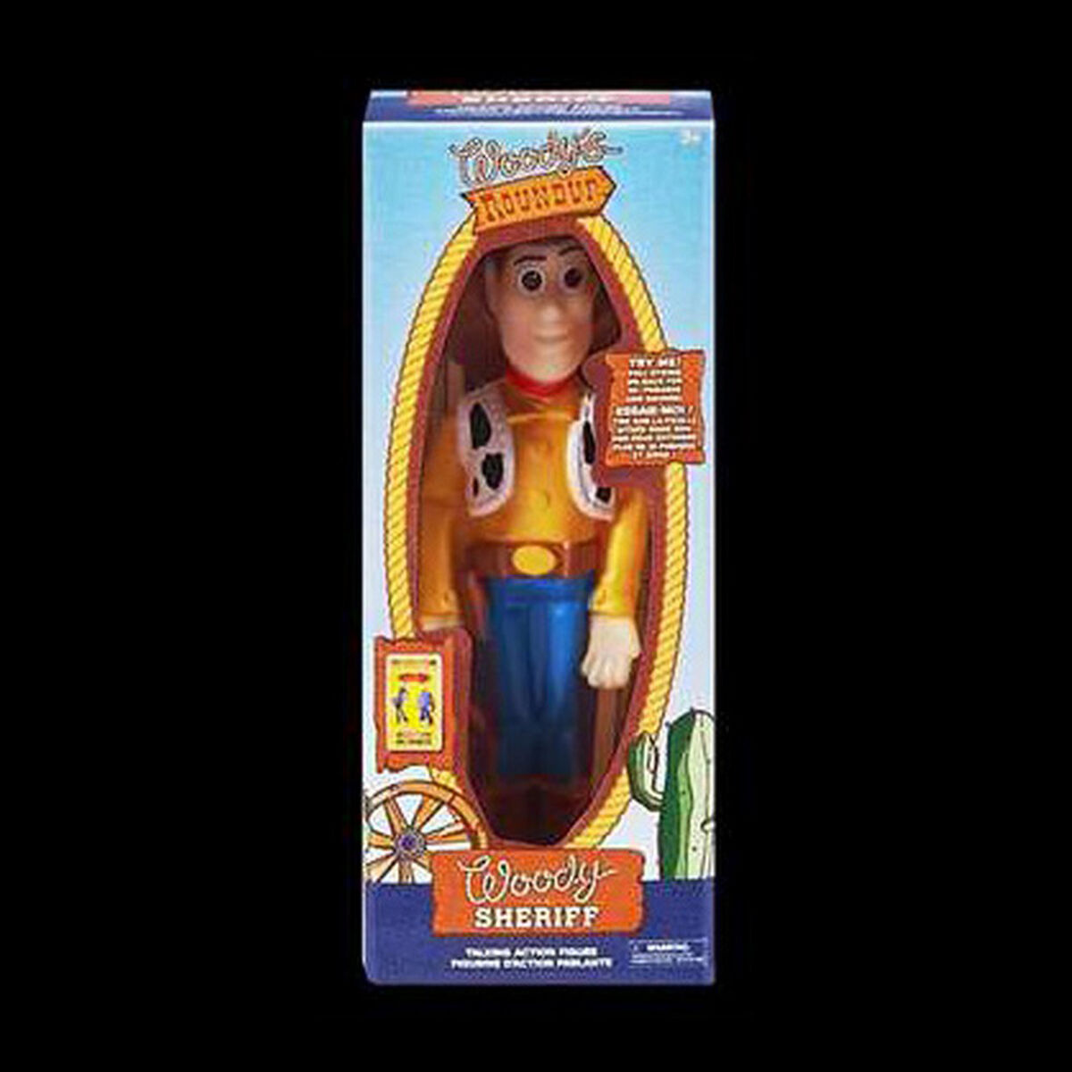 Muñeco Woody de Toy Story en una caja. Woody tiene camisa amarilla, pantalones azules y una placa de sheriff. La caja dice "Woody Sheriff".
