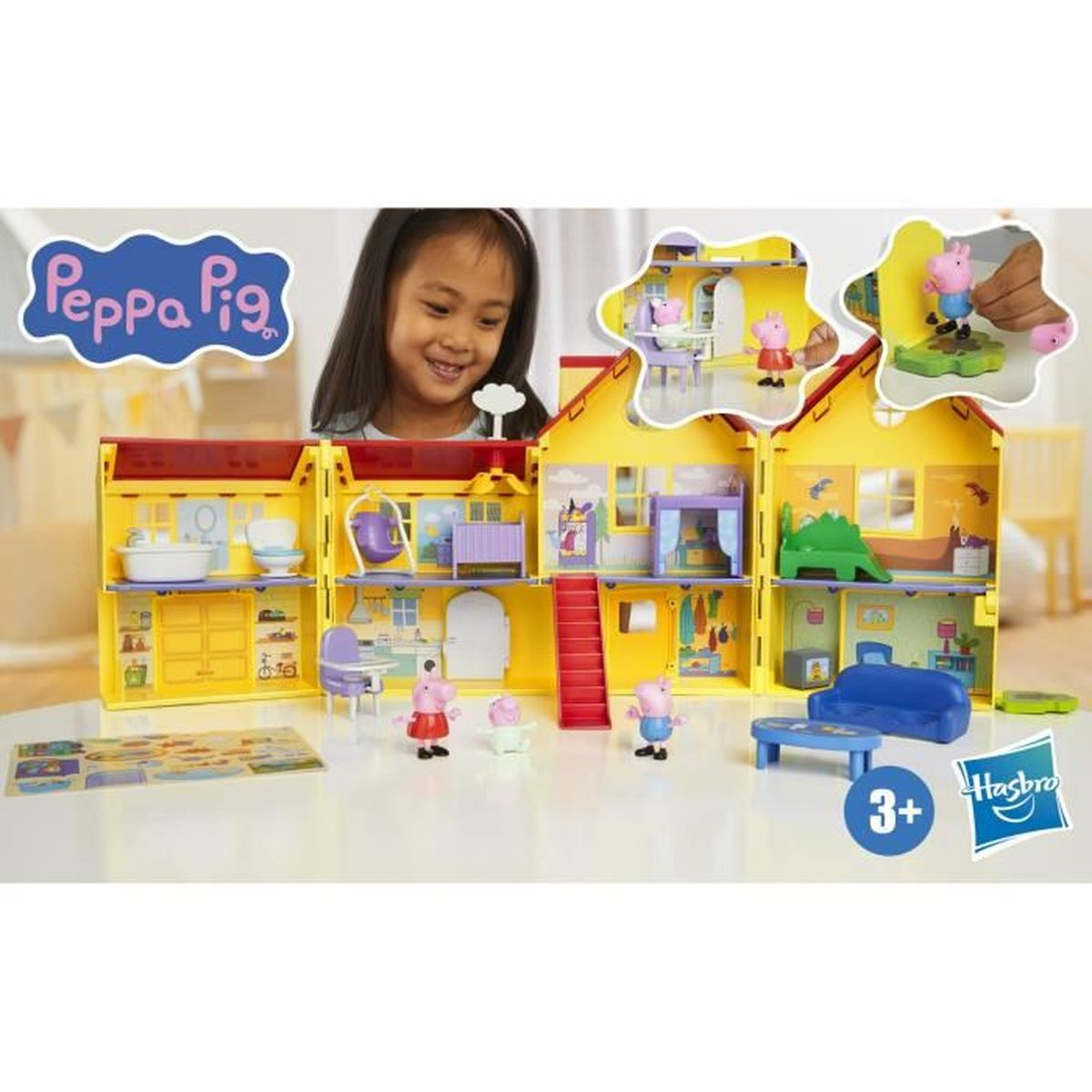 Una niña sonríe ante un juego de Peppa Pig. La casa amarilla tiene techo rojo y está poblada de figuras y muebles.