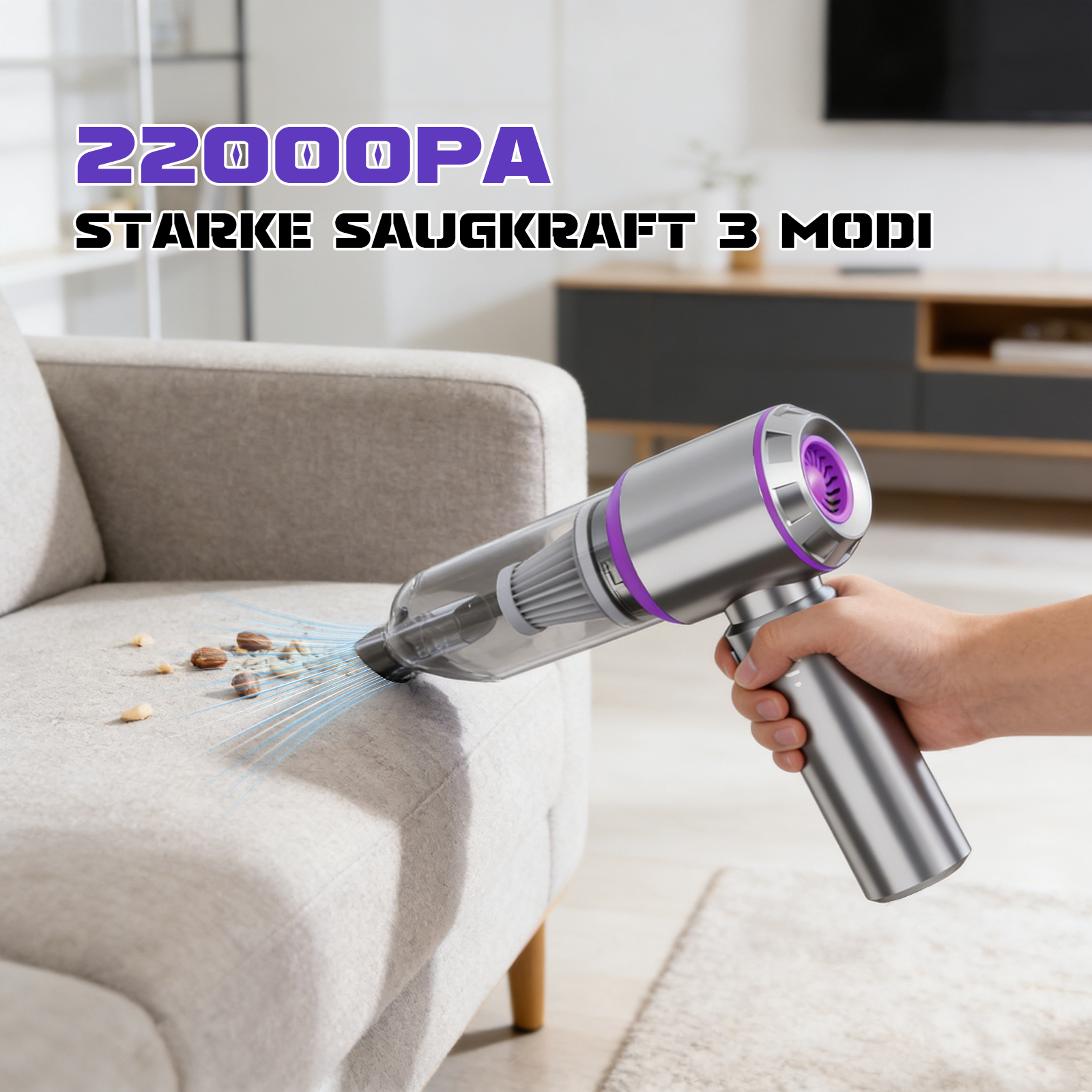 Ein Handstaubsauger reinigt ein Sofa. Krümel sind vorhanden. Oben steht "22000PA" und "STARKE SAUGKRAFT 3 MODI".