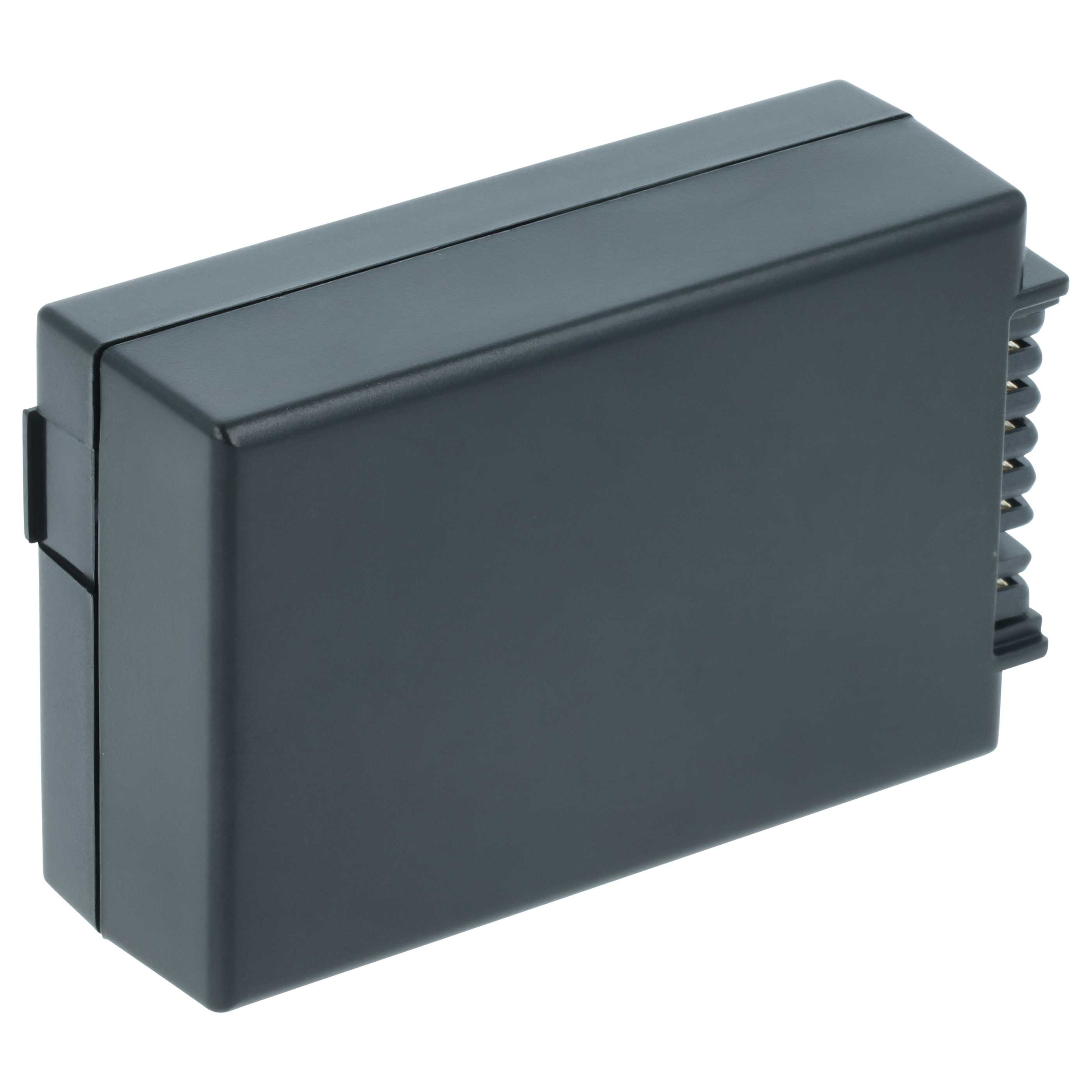 Ein dunkelgraues rechteckiges Objekt, möglicherweise eine Batterie, auf weißem Hintergrund. Es hat eine geriffelte Seite.