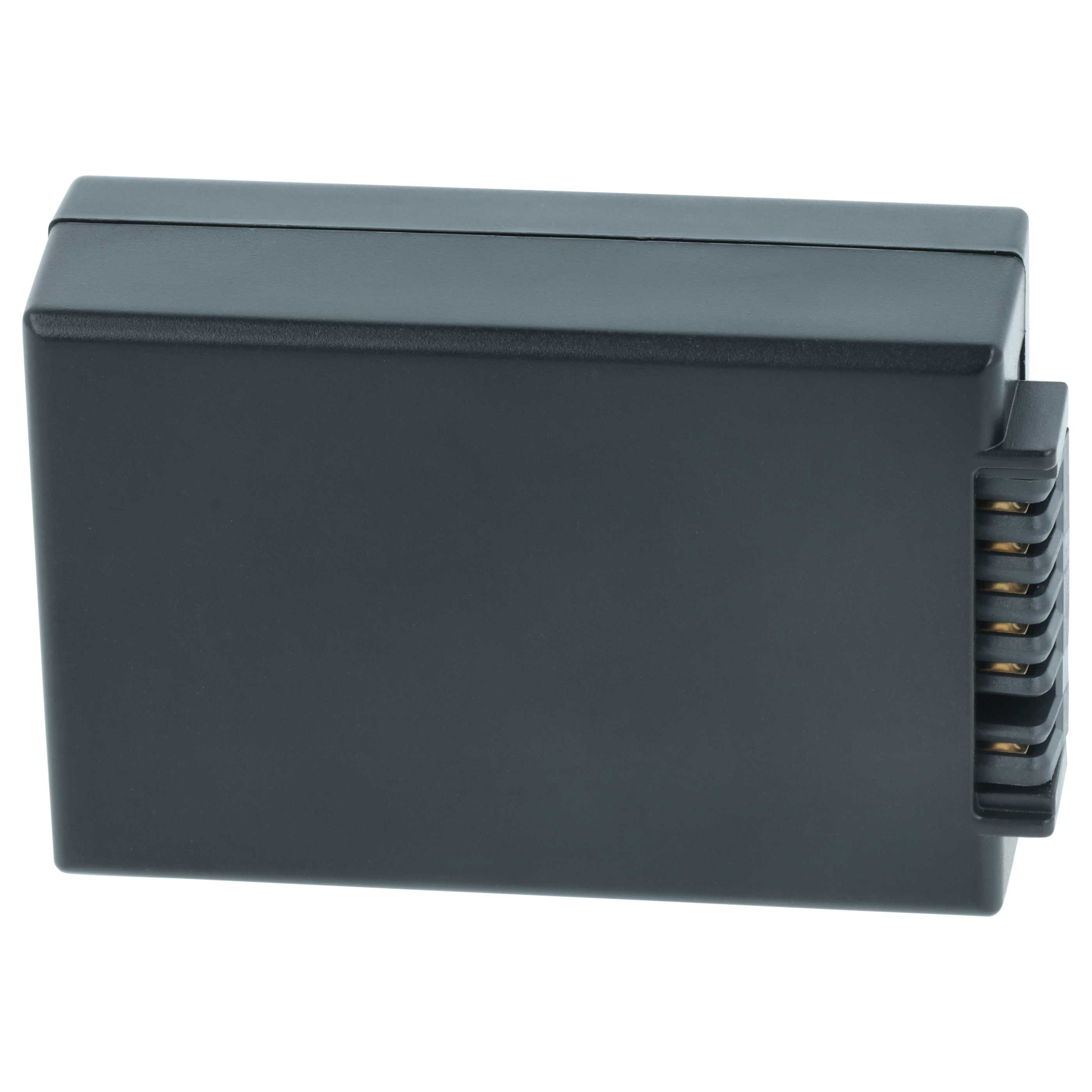 Ein dunkelgraues rechteckiges elektronisches Bauteil. Es hat einen Verbinder mit Goldkontakten.