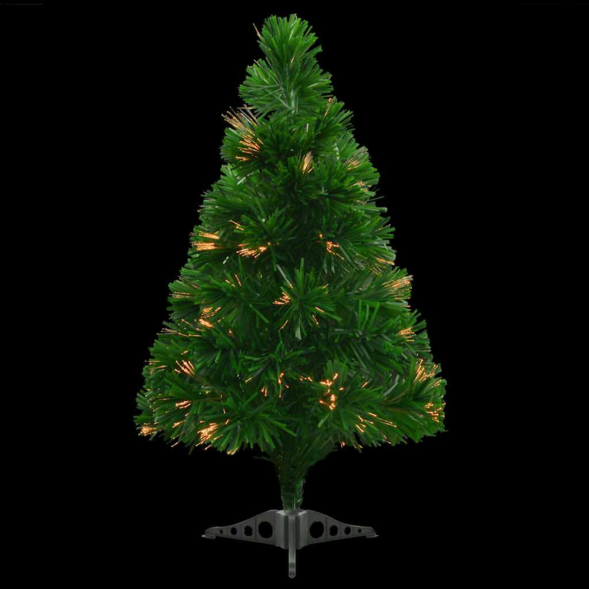 Ein kleiner grüner Weihnachtsbaum mit Lichtern steht auf schwarzem Hintergrund. Der Baum hat einen grauen Fuß.