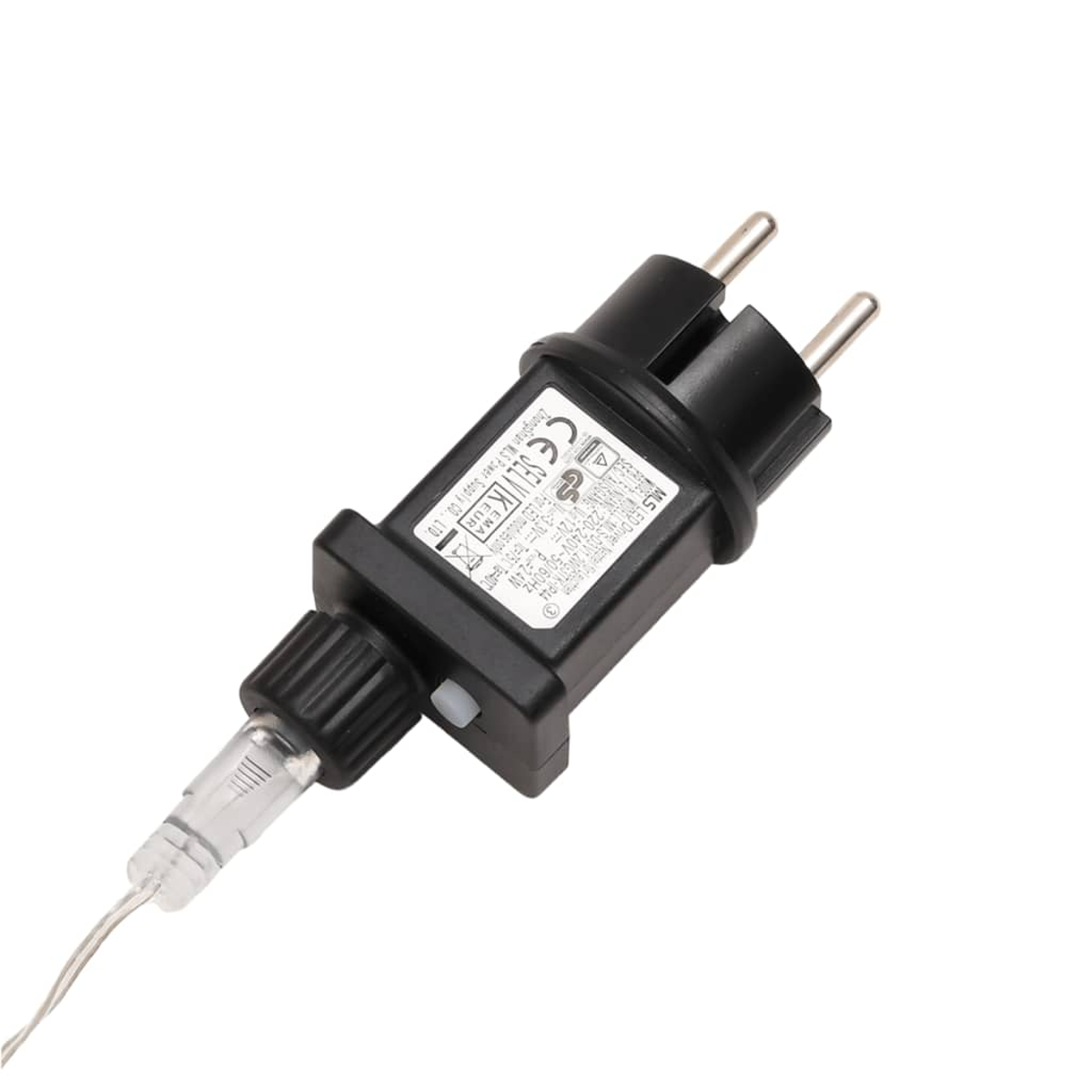 Ein schwarzer Netzadapter mit silbernen Stiften. Ein klares, dünnes Kabel geht vom Adapter aus.