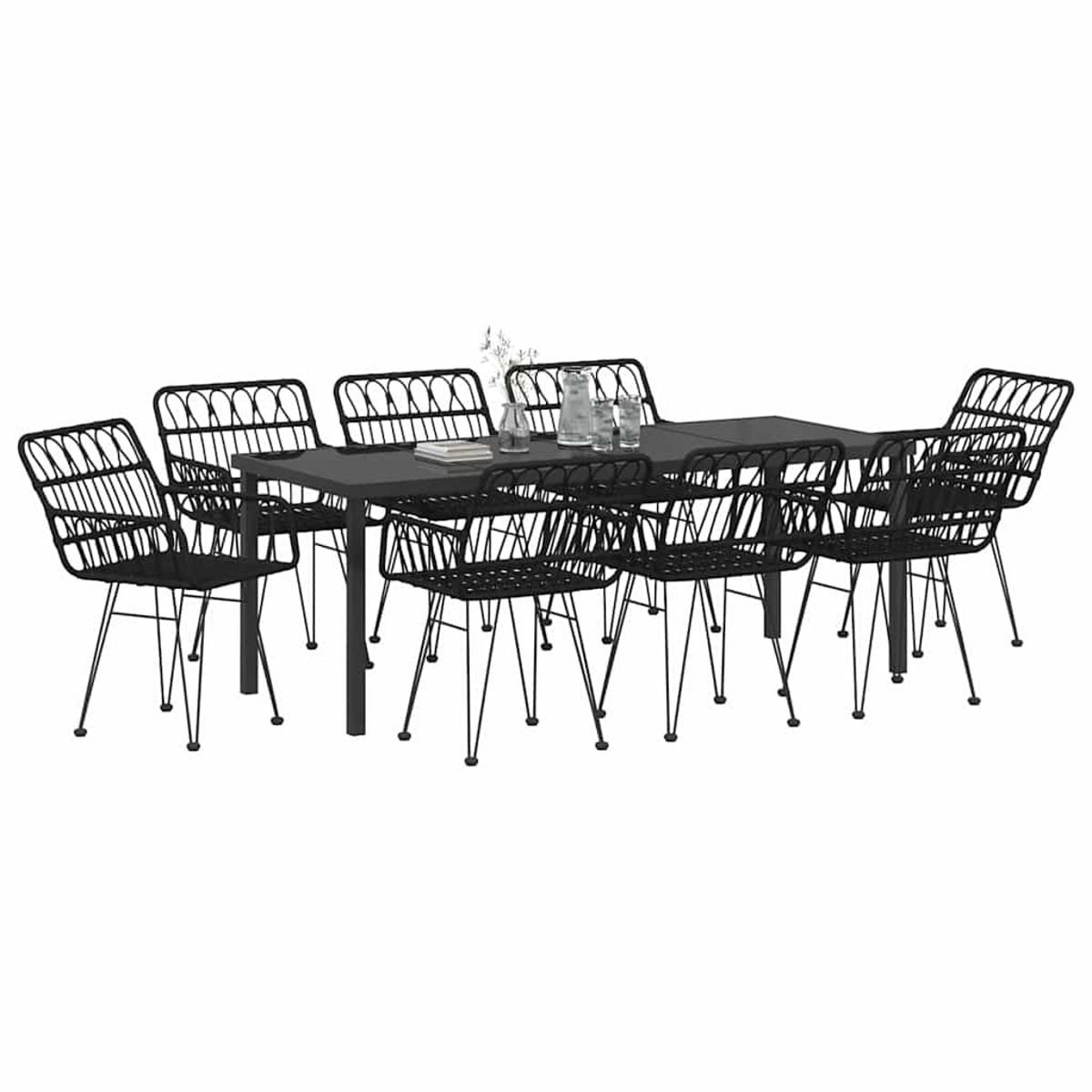Una mesa negra con ocho sillas a juego. Las sillas tienen intrincados trabajos en metal. Sobre la mesa hay vasos y un pequeño jarrón.