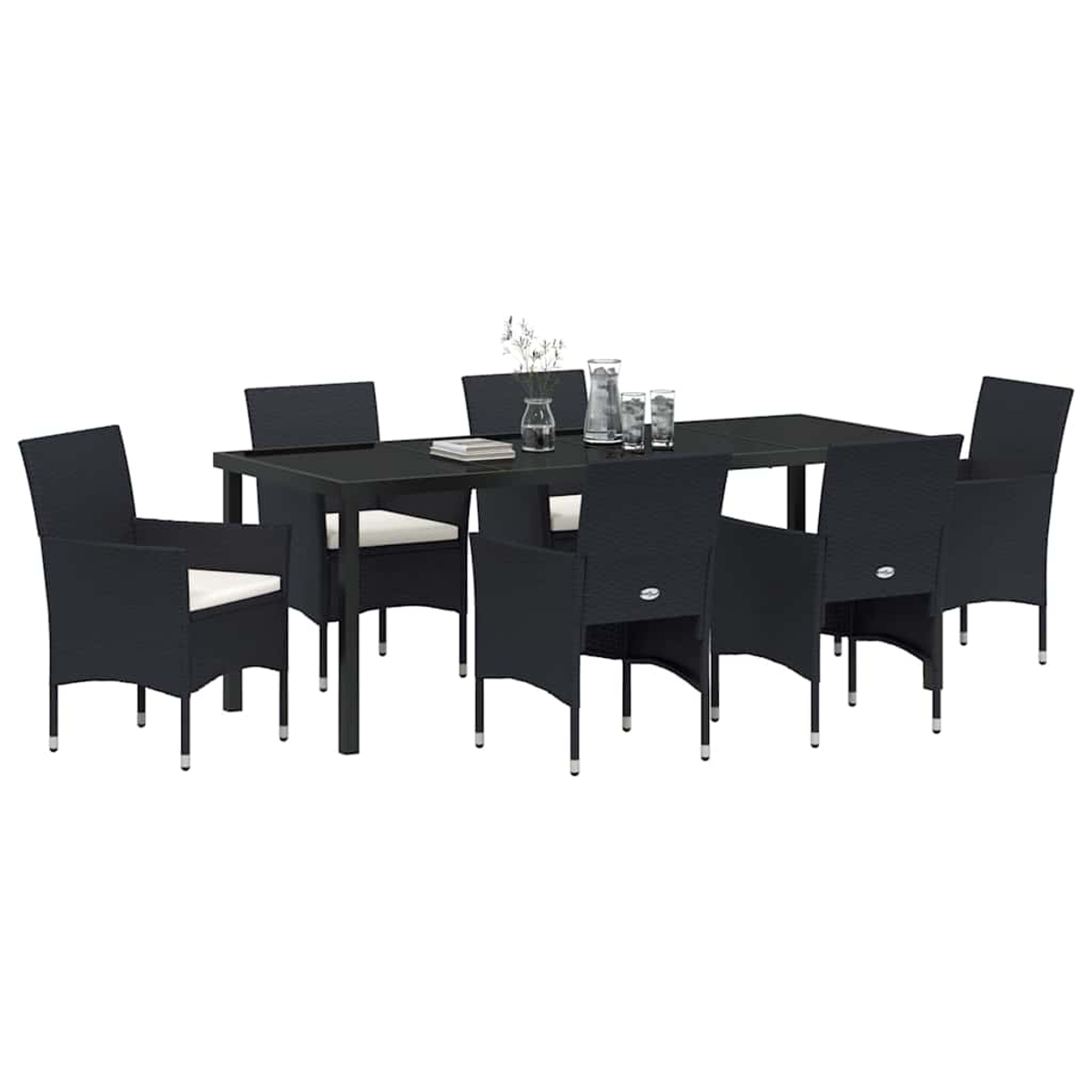 Un set da pranzo nero da esterno con un tavolo rettangolare e sei sedie. Il tavolo ha un piano in vetro. Ci sono bicchieri e decorazioni sopra.