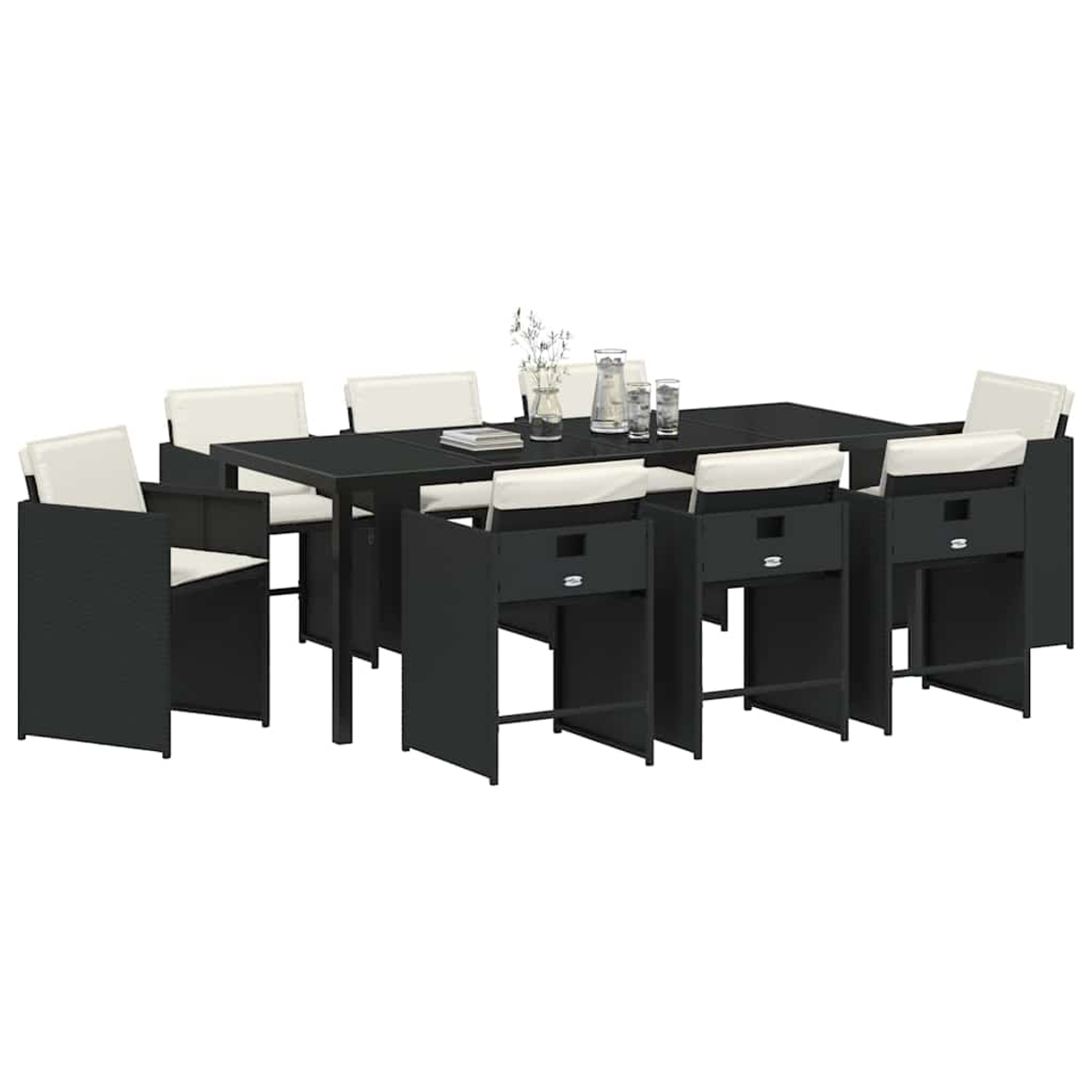 Un set da pranzo nero da esterno con un tavolo rettangolare e otto sedie. Le sedie hanno cuscini bianchi e il tavolo ha bicchieri.